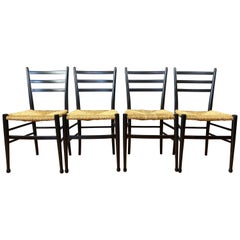 Set of Four Italian Ponti-Style Ebonized Wood Side Chairs with Rush Seats, 1960s