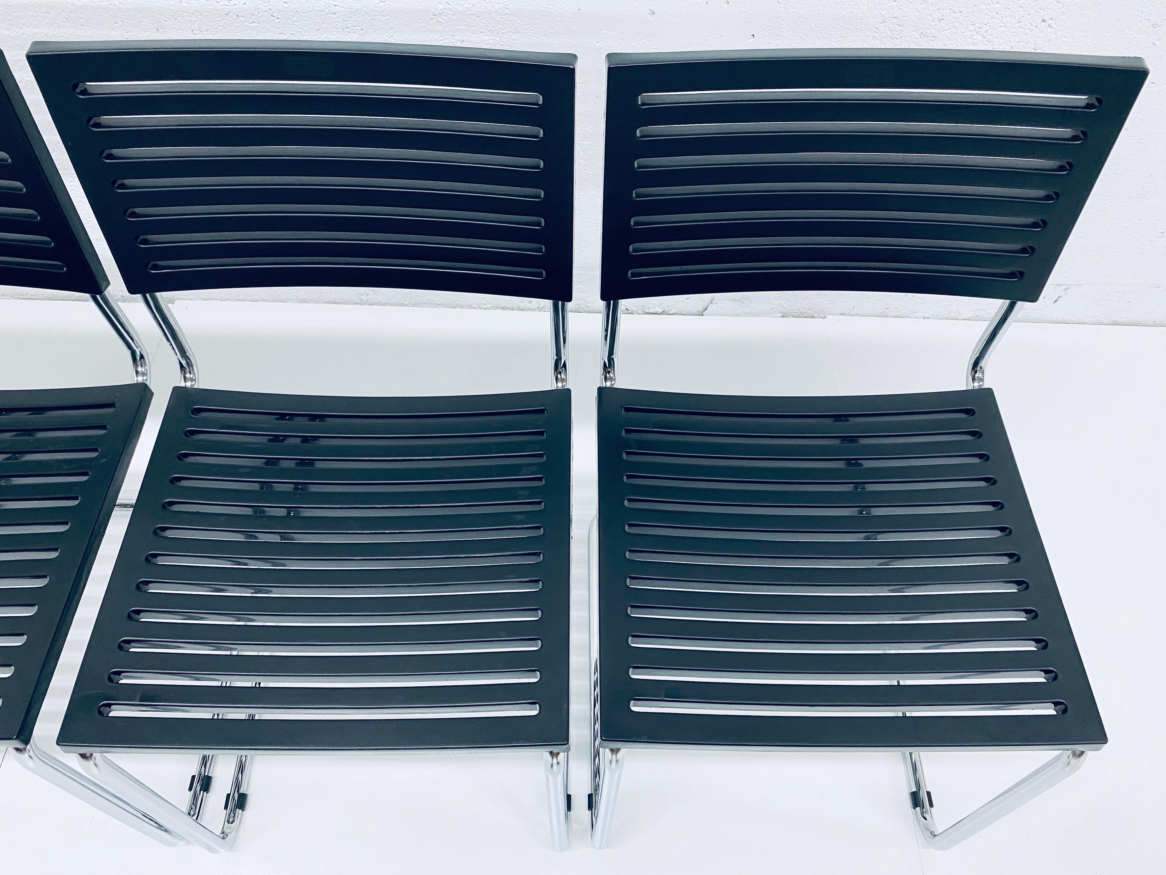 Set of Four Italian Postmodern Cantilevered Chrome Tube Dining Chairs In Good Condition In Miami, FL