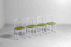 Set of four Italian postmodern metal chairs with sculpted seats, 1980s