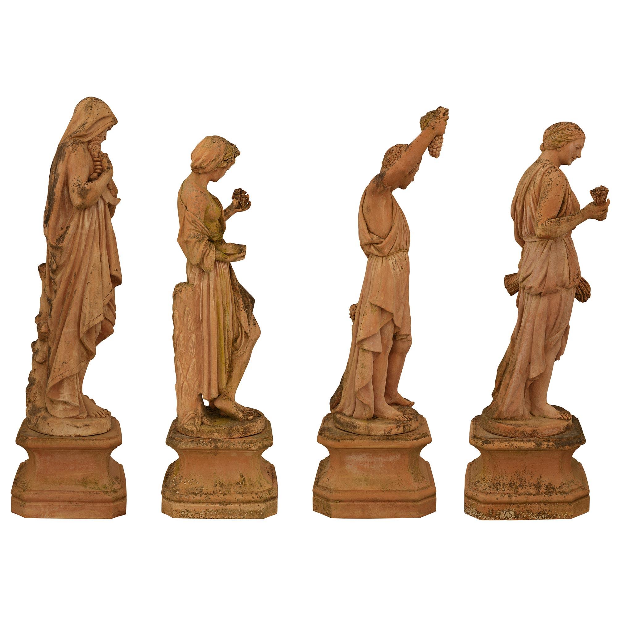 Set of four Italian Turn of the Century Terra Cotta statues of The Four Seasons In Good Condition For Sale In West Palm Beach, FL