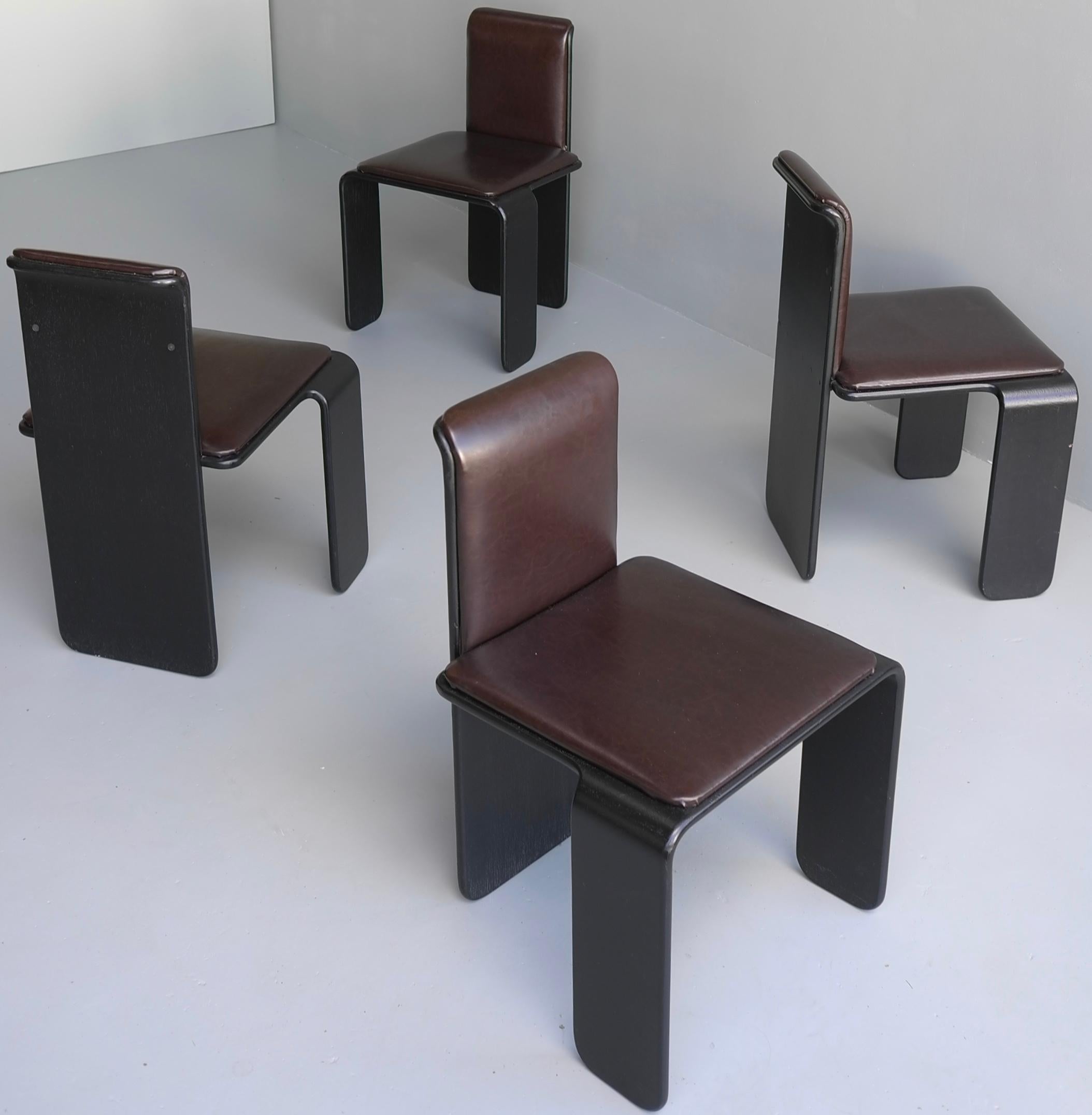 Set of four Italian wooden monk chairs in black and dark brown, 1970s.