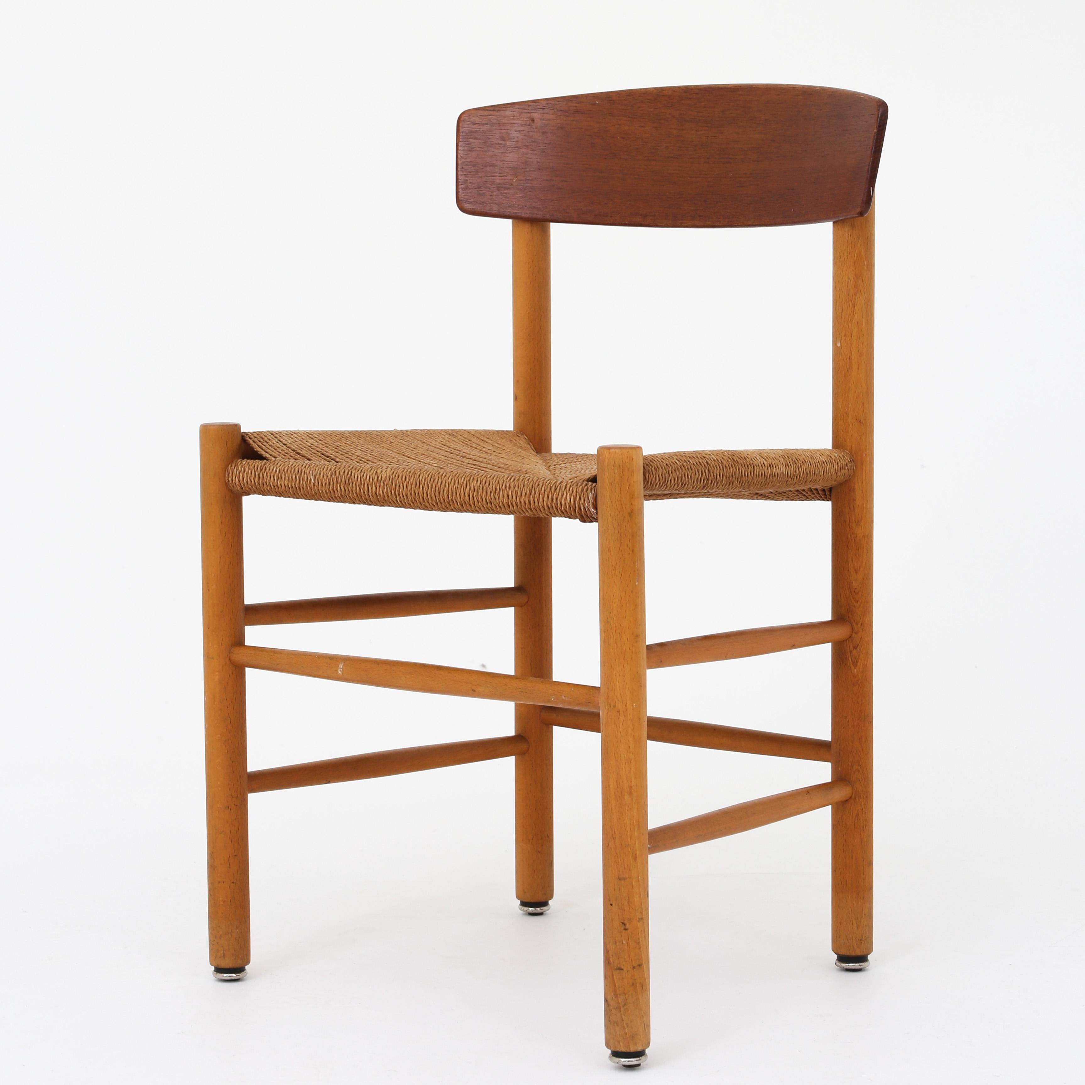 Børge Mogensen and FDB. J39 - Set of four dining chairs with beech frame, teak cup and woven paper yarn seat.