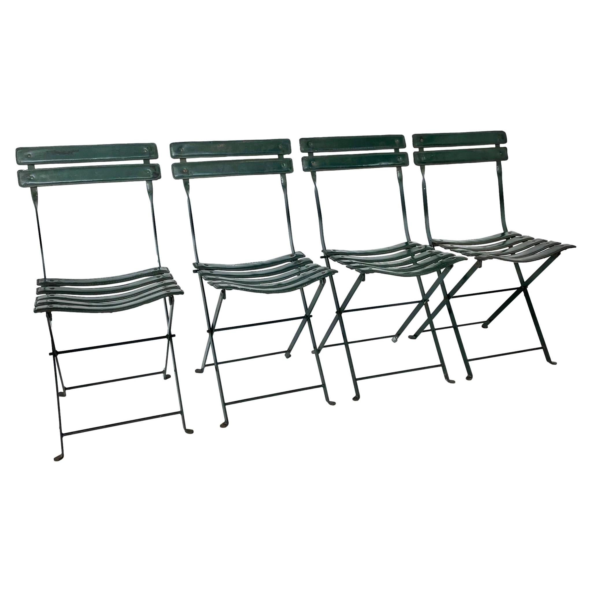 Set of Four Jacques Adnet Leather Folding Chairs