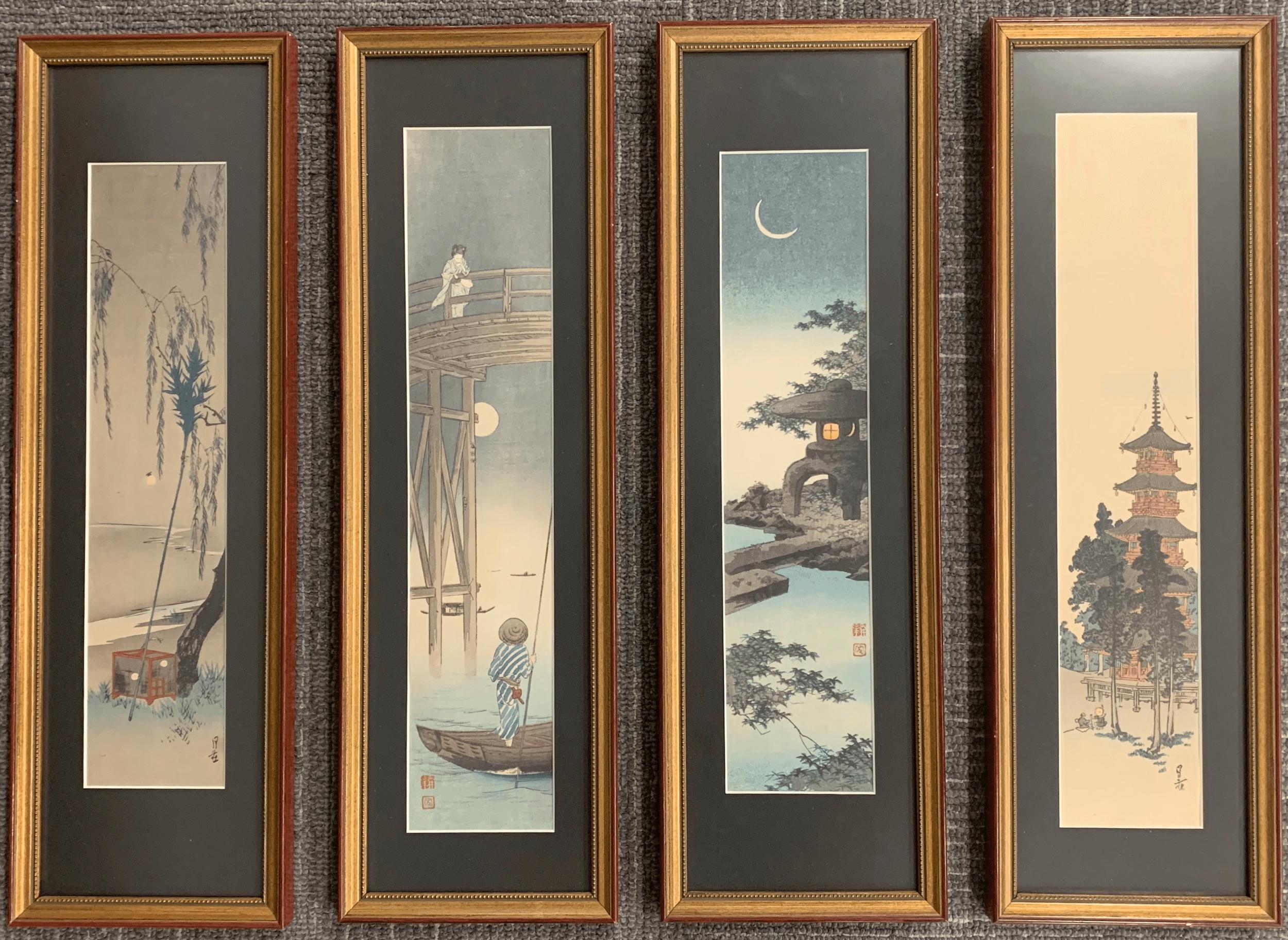 Set of four Japanese wood block prints. Each in a custom gilt wood frame with black matted interiors under glass.