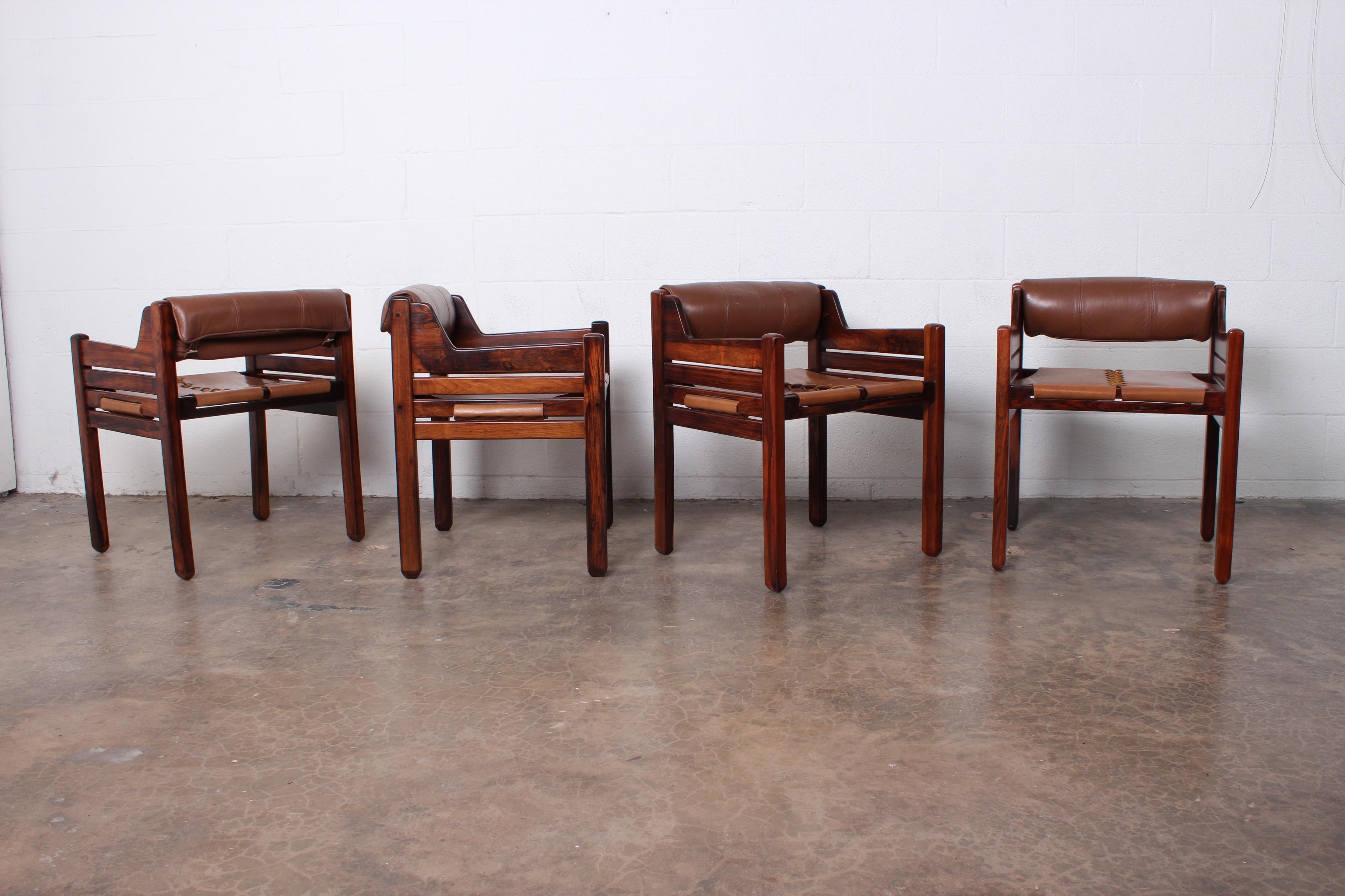 A beautiful set of four solid rosewood and leather armchairs by Jean Gillon for Italma Wood Art.