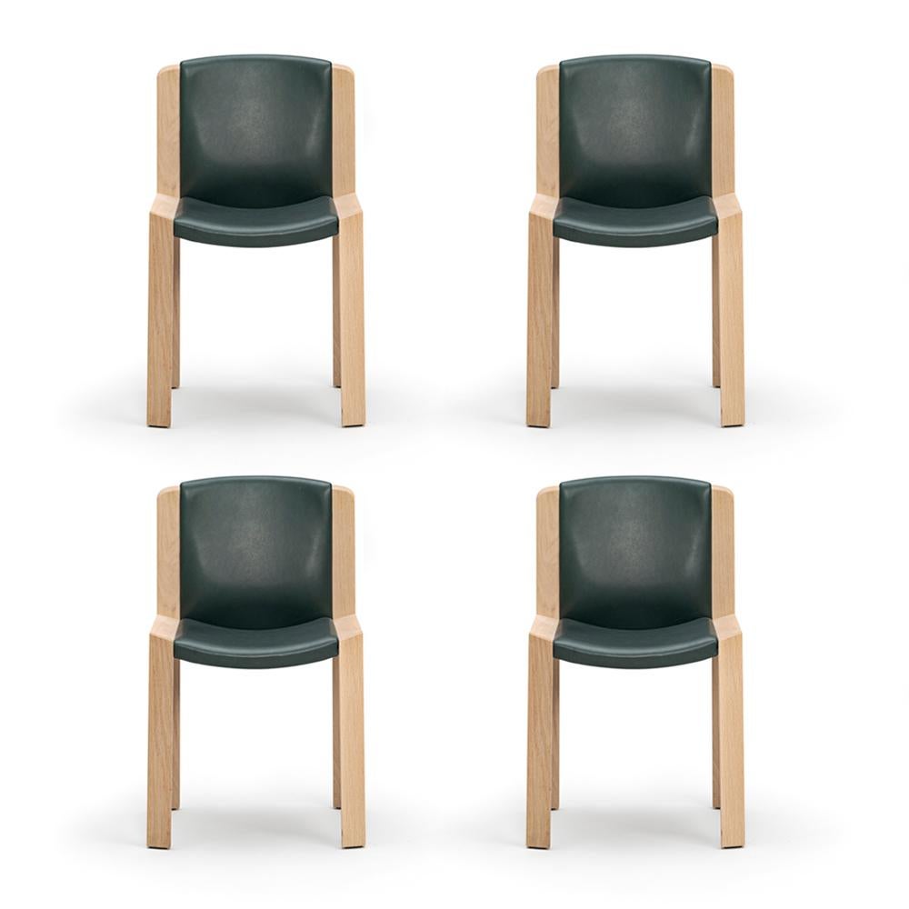 Chair designed by Joe Colombo in 1965. 

Designed by the forward-thinking Italian designer Joe Colombo, Chair 300 is a beautiful example of his functional design sensibility. Upholstered seat and back gently curved inside a modest, clear wooden