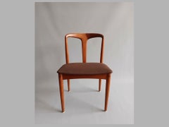 Set of four Johannes Andersen Danish teak dining chairs