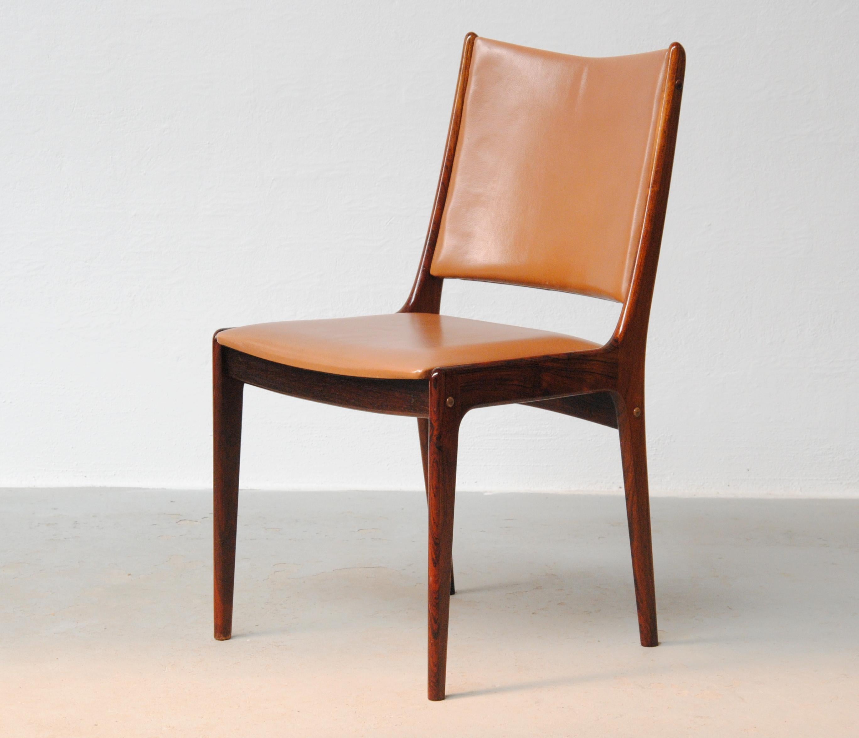 Danish Four Restored Johannes Andersen Rosewood Dining Chairs Include Custom Upholstery For Sale