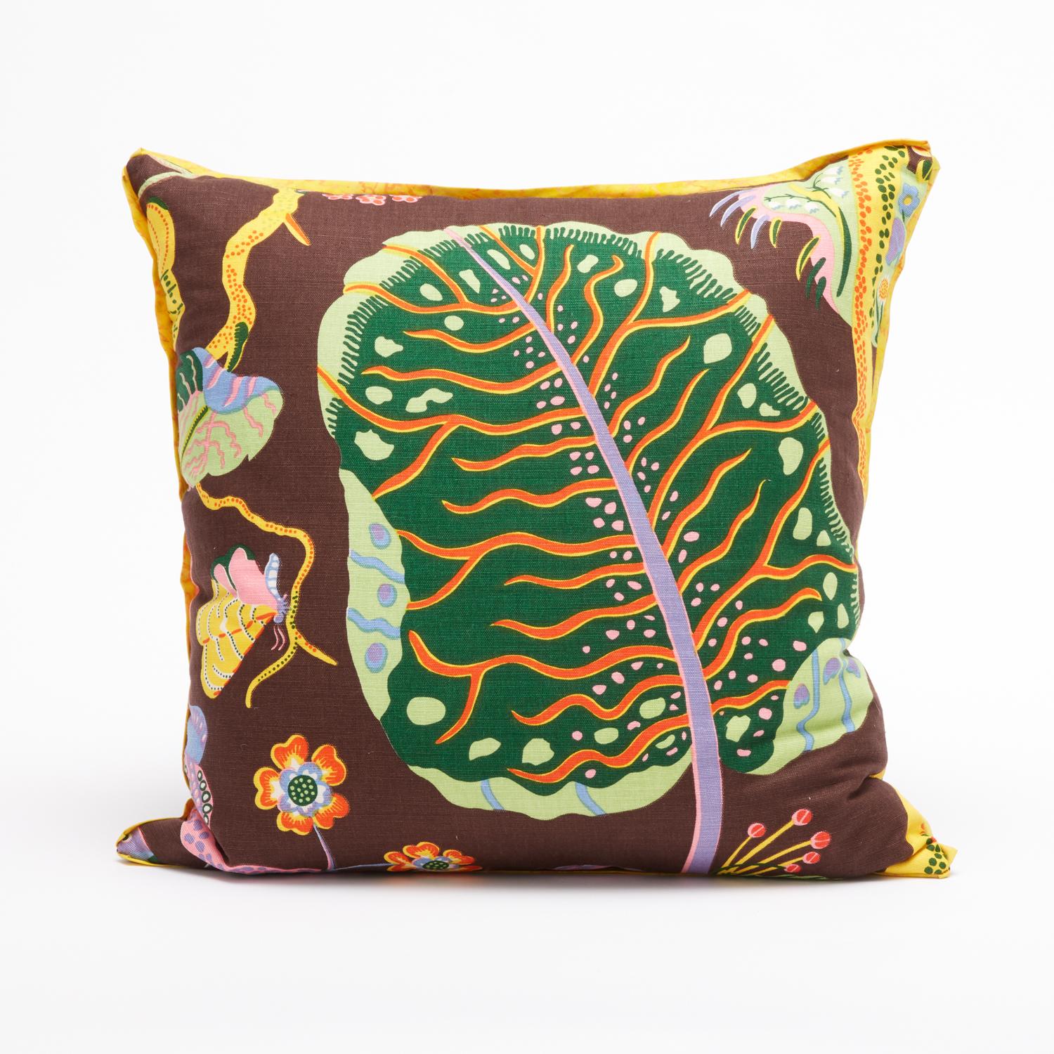 A set of four square cushions featuring vintage fabric by Austrian designer Josef Frank. Each cushion displays a design motif from Josef Frank's 