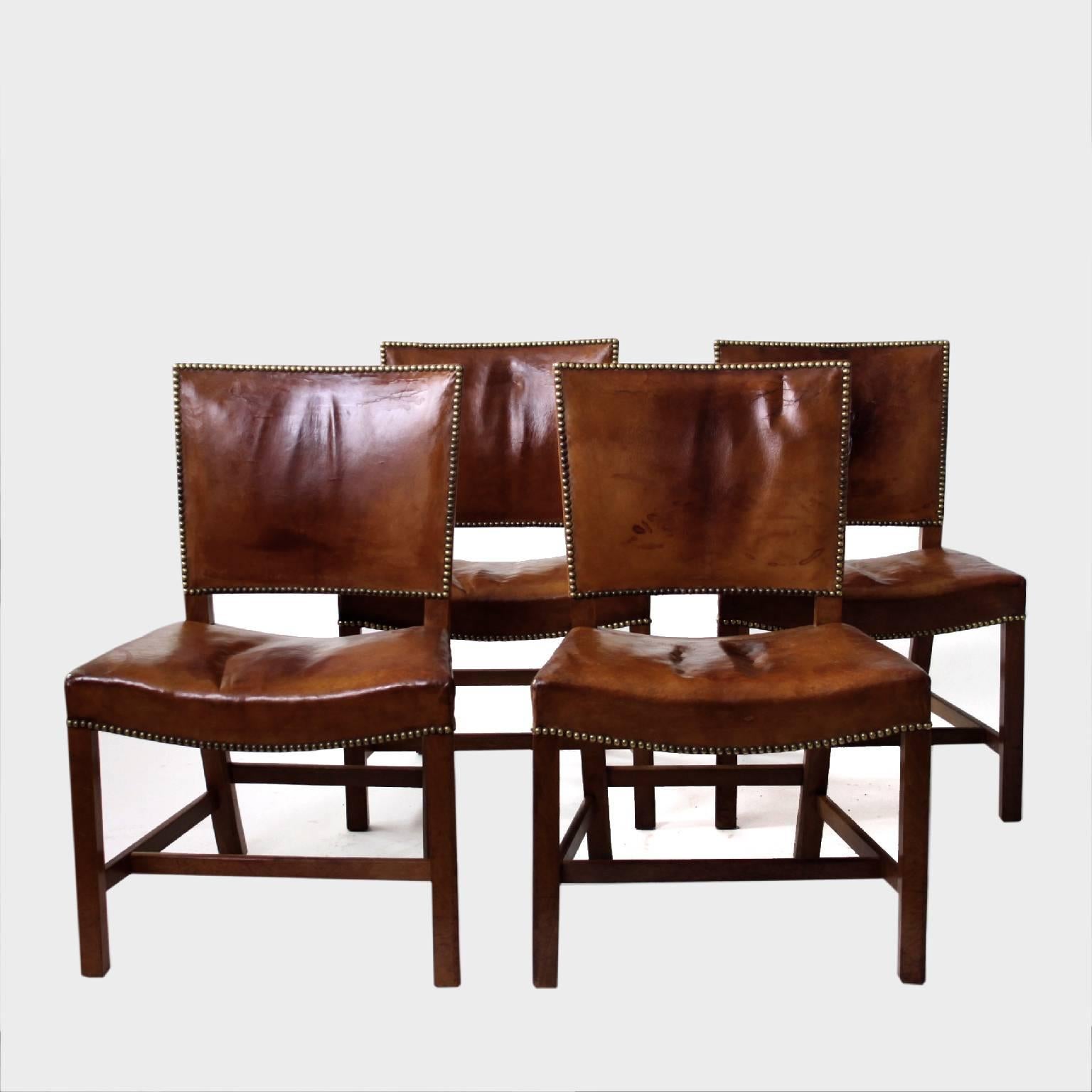 KAARE KLINT & RUD RASMUSSEN SNEDKERIER - SCANDINAVIAN MODERN

A beautiful set of four early Kaare Klint red chairs / Barcelona chairs with mahogany frame, brass nails and original patinated Niger leather that the Kaare Klint red chairs are so famous