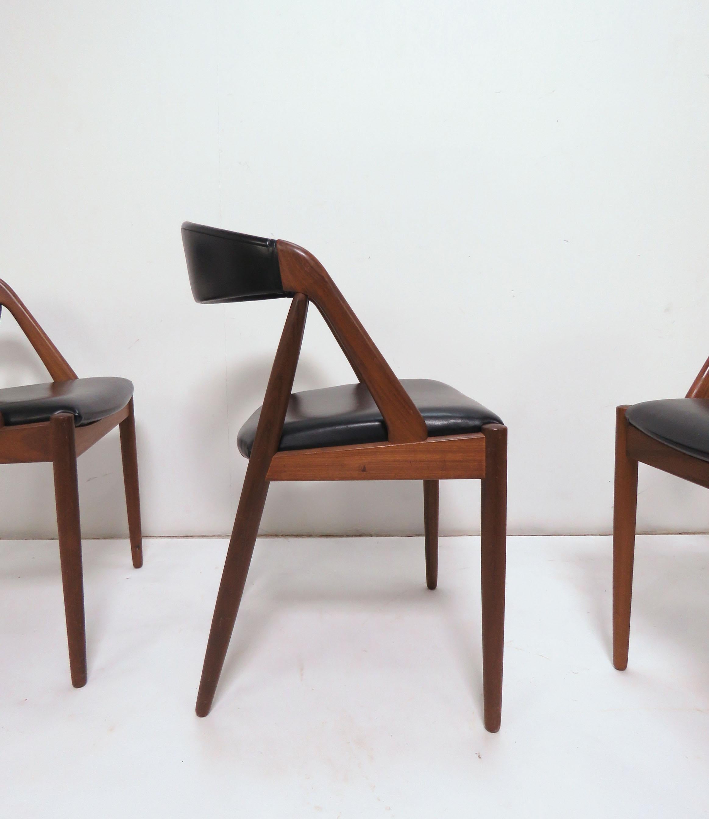 Set of four Danish teak Model 31 dining chairs by Kai Kristiansen, circa 1960s.