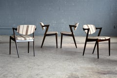 Set of Four Kai Kristiansen Model 42 Dining Chairs in Rosewood Stained Oak