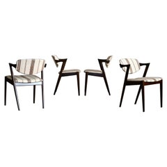 Set of Four Kai Kristiansen Model 42 Dining Chairs in Rosewood Stained Oak