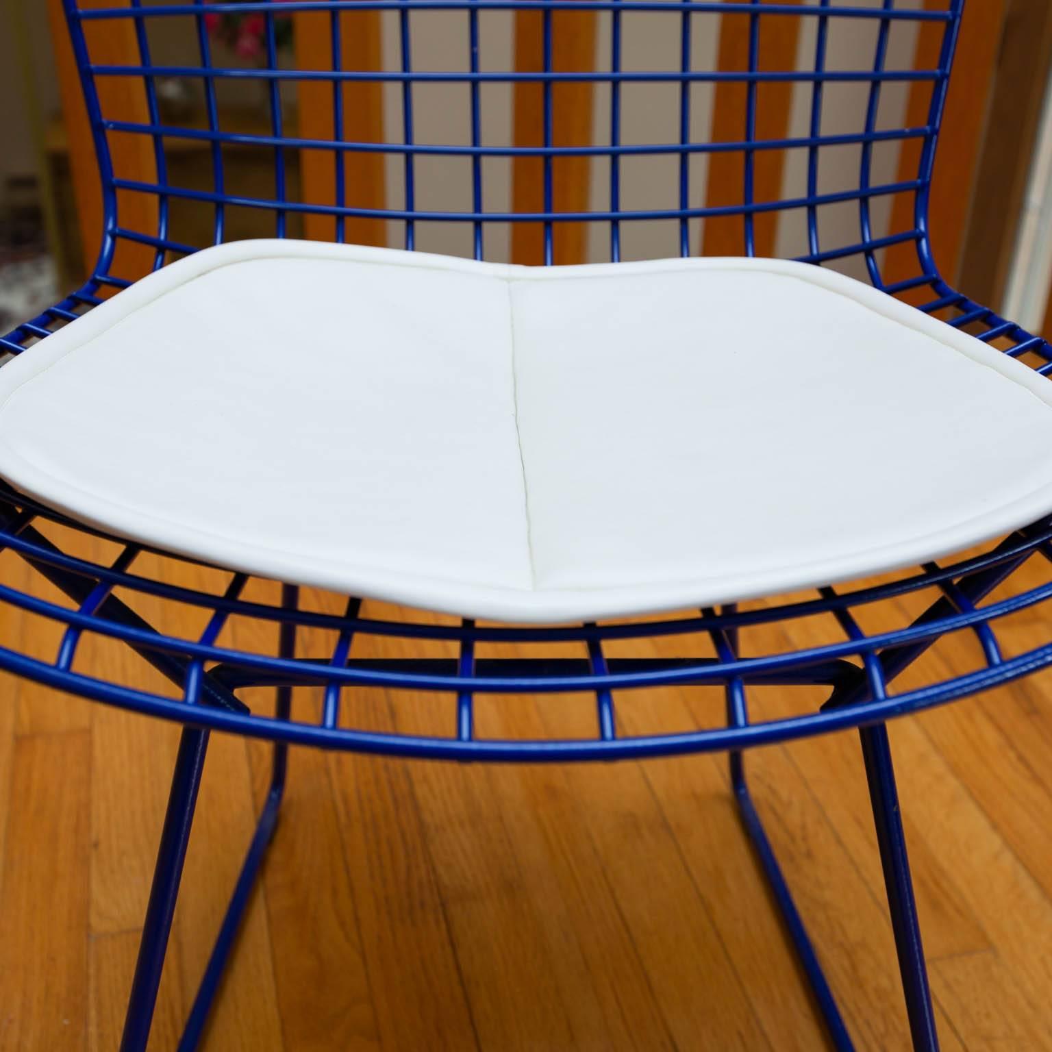 Set of four vintage Harry Bertoia for Knoll wire side chairs in deep blue.