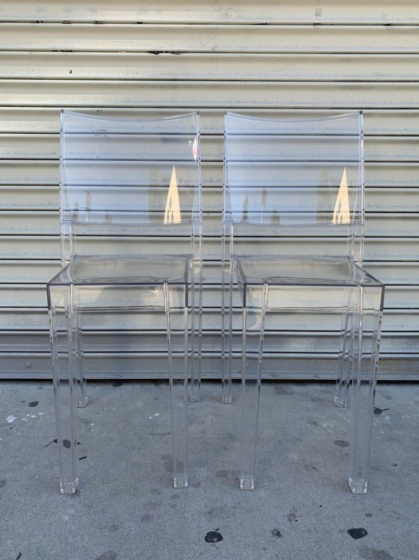 Designed by Philippe Starck for Kartell, the La Marie chair is the first of its kind with it single polycarbonate mold that\'s entirely translucent. Robust in construction, light and airy in aesthetic, and enduring in design and quality, the La