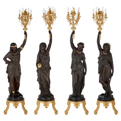 Set of Four Large Academic Style Torchères Emblematic of the Continents