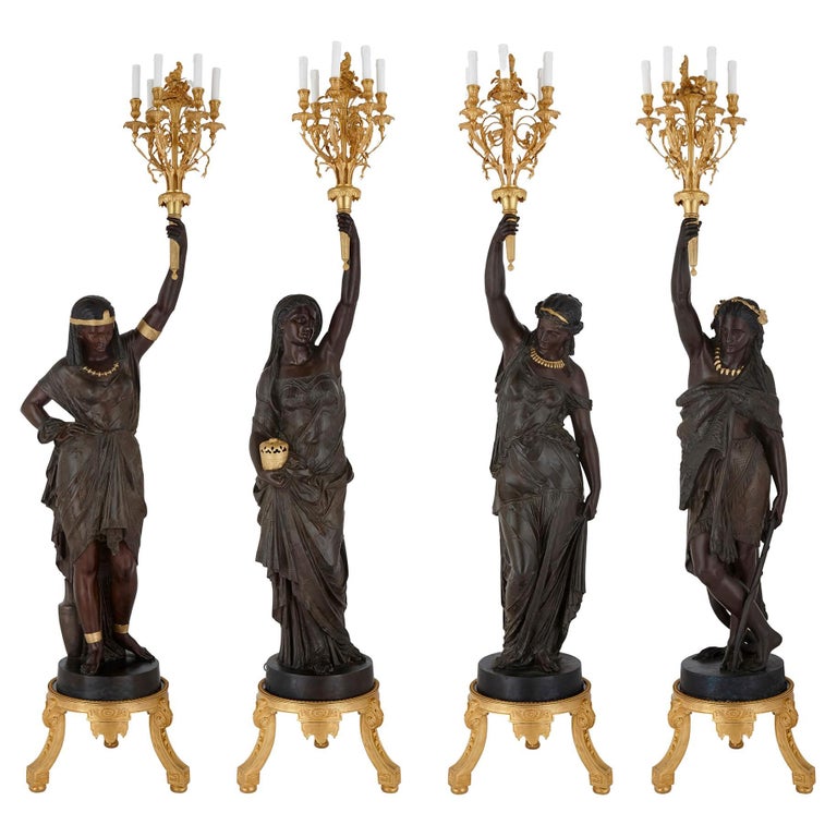 Set of Four Large Academic Style Torchères Emblematic of the Continents For Sale