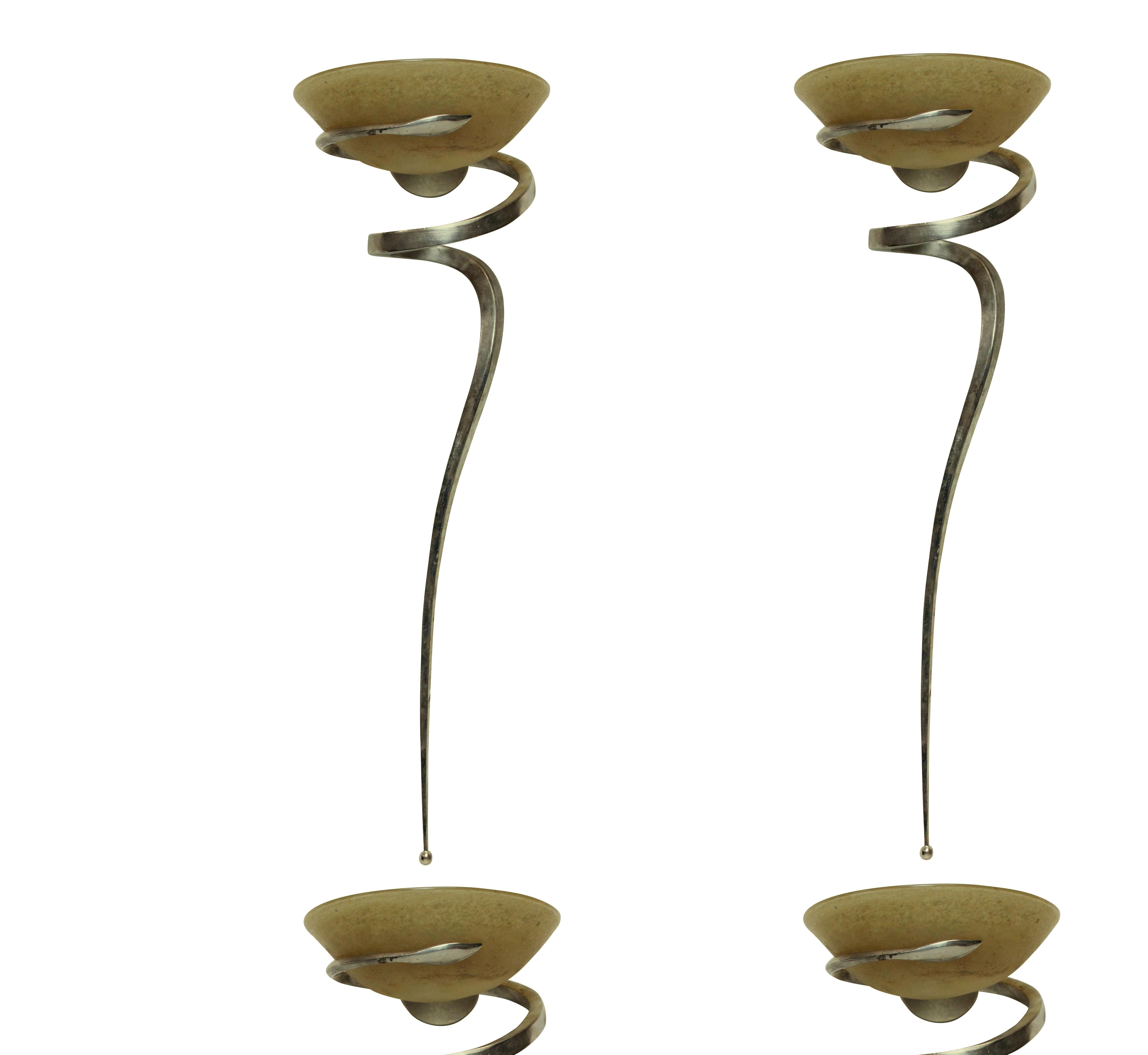 A set of four large French wall sconces in silver with pâte de verre cups, which light from inside.