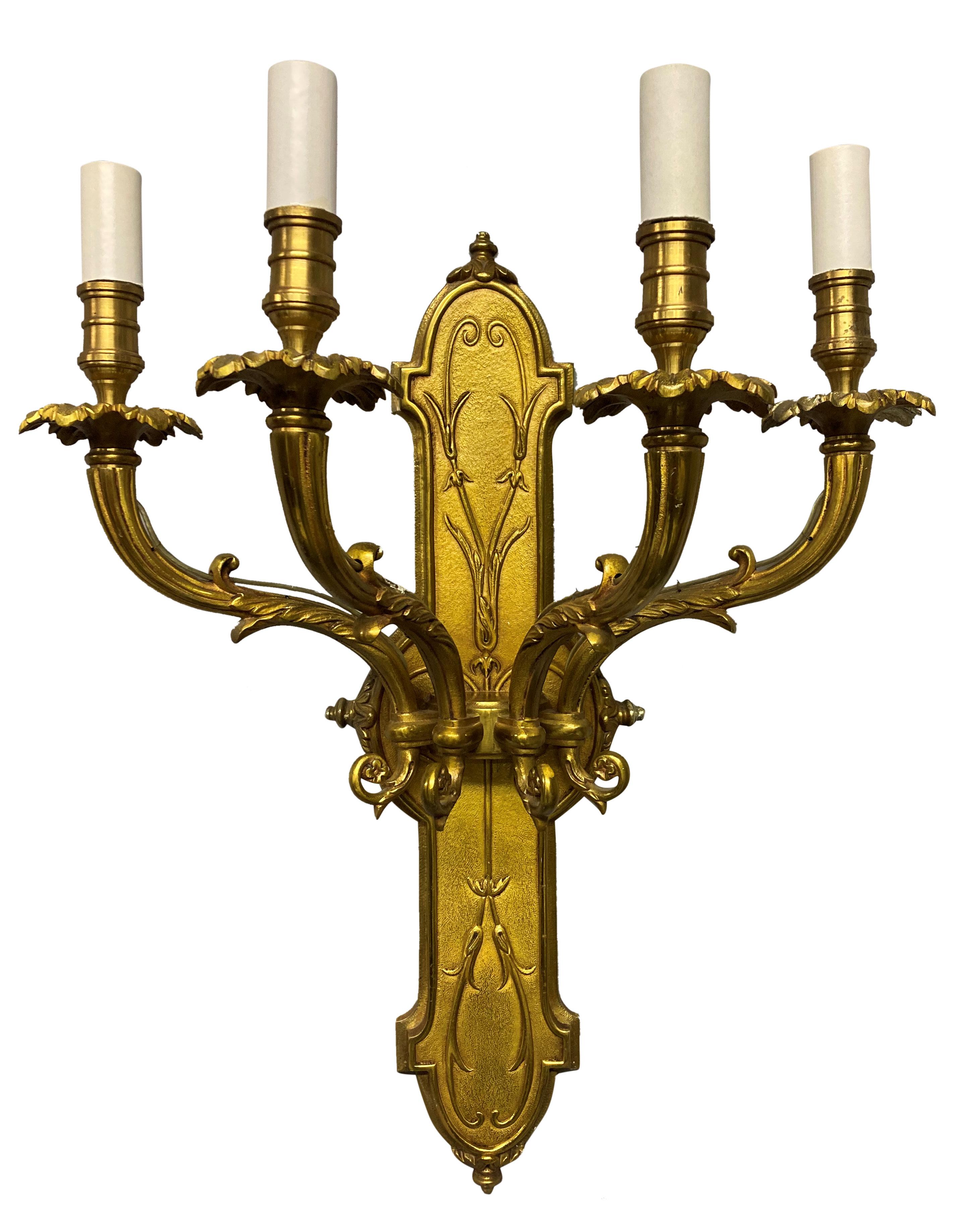 A set of large French gilt bronze four branch wall lights, formerly of Claridges. There are another ten of these in seperate listings.