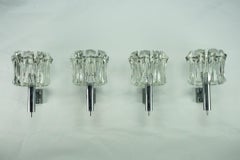 Set of four large Murano glass elements and chromed brass sconces, Italy 1960s.