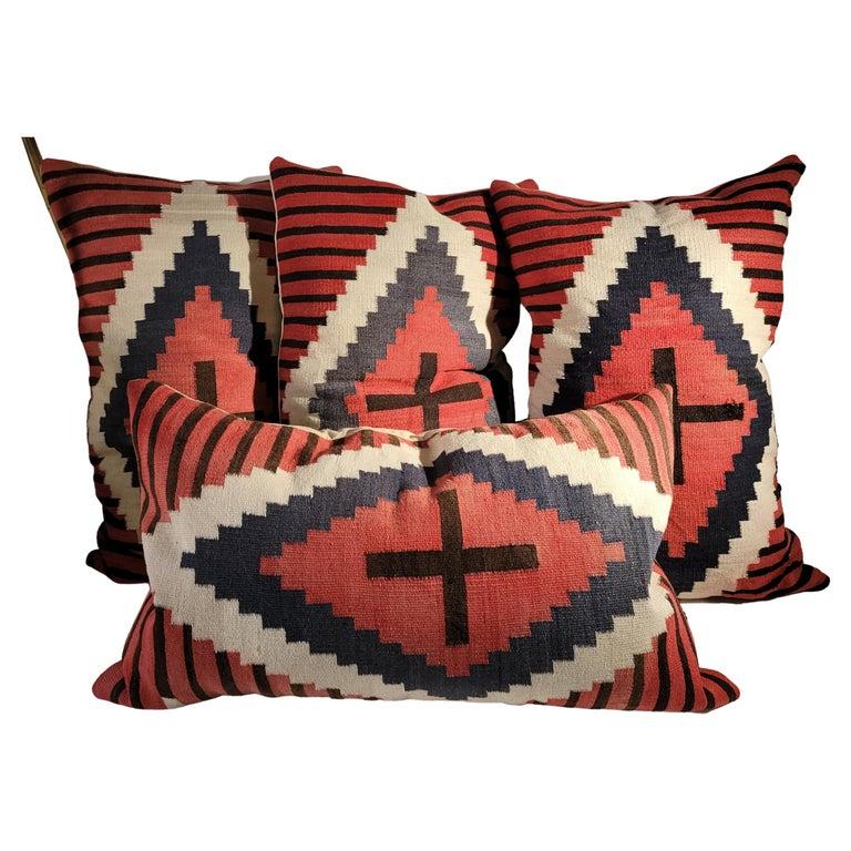 Large Navajo Bolster Pillows. Each pillow is made large due to the wonderful large Cross pattern that was placed on the wool fabric Within the Eye Dazzler. great Striped to accentuate the Center Eye.
Hand Dyed with fruits and vegetable dyes. Great