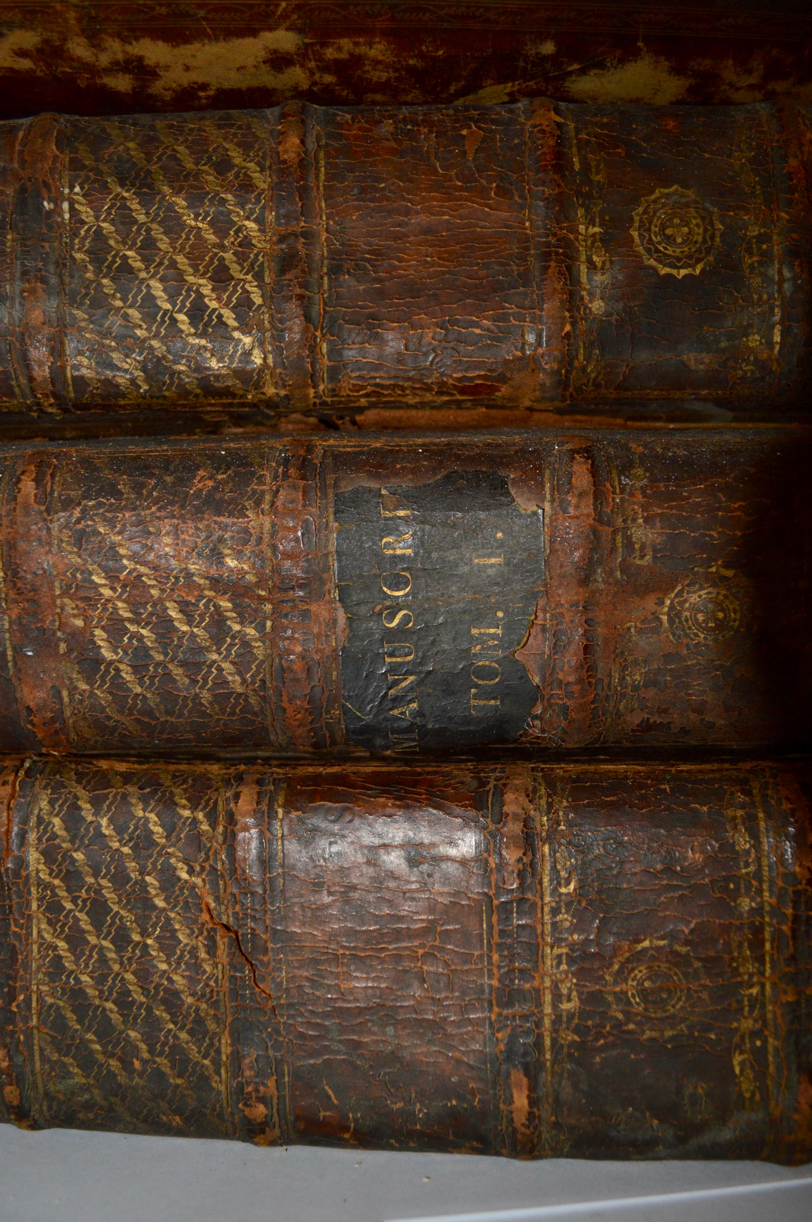 Set of four large thick, 18th century leather-bound books for decoration
Latin text, catalogues 
