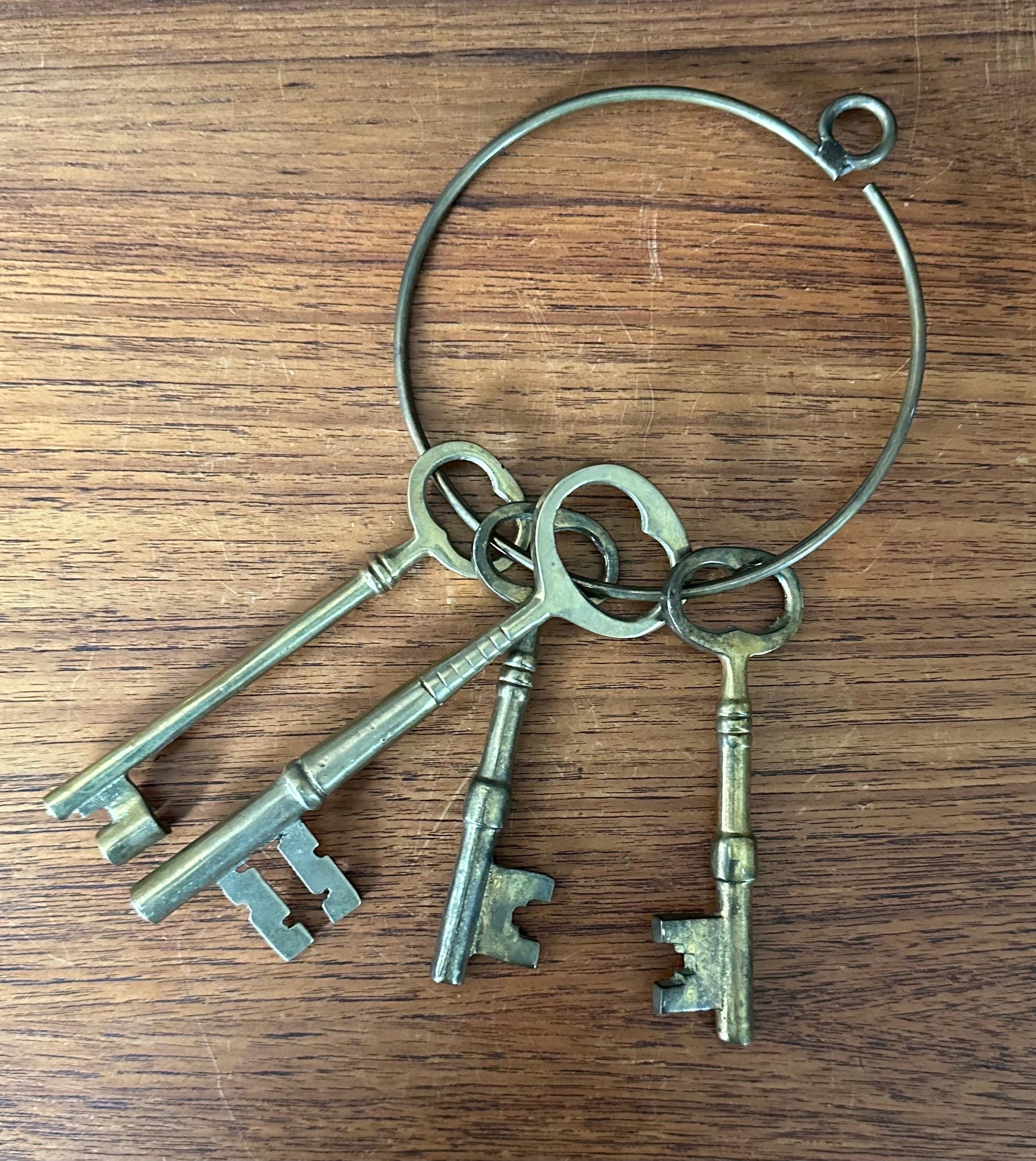 American Set of Four Large Vintage Skeleton Keys on a Ring For Sale