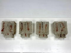 Set of four large wall lamps in murano glass elements. Italy 1970s