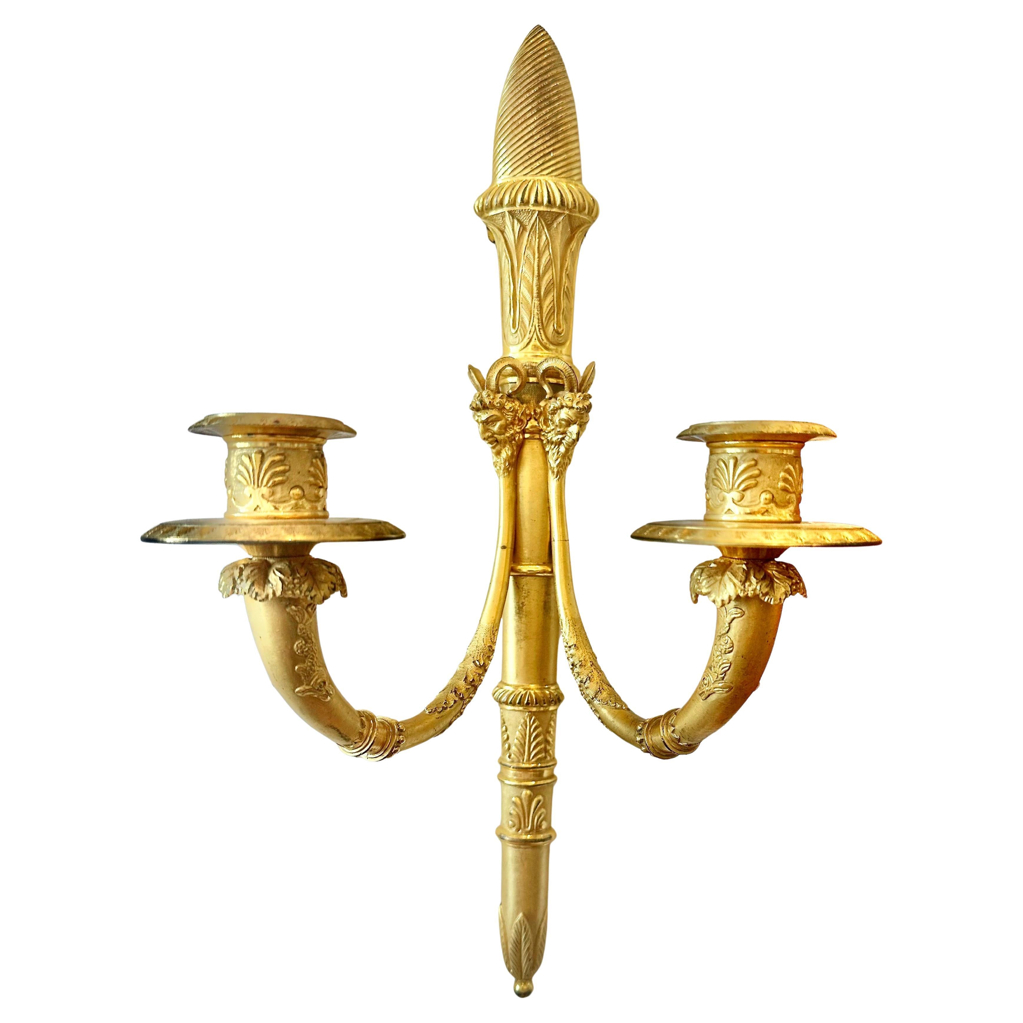 Rare Set of Four Period French Directoire or Le Premier Empire Sconces.  Two arm wall lights in the Late 18th Century Neoclassical form.  Dull and Burnished Fire Gilding.  Extreme detail, casting and hand work.  Original condition.  Satyr Head