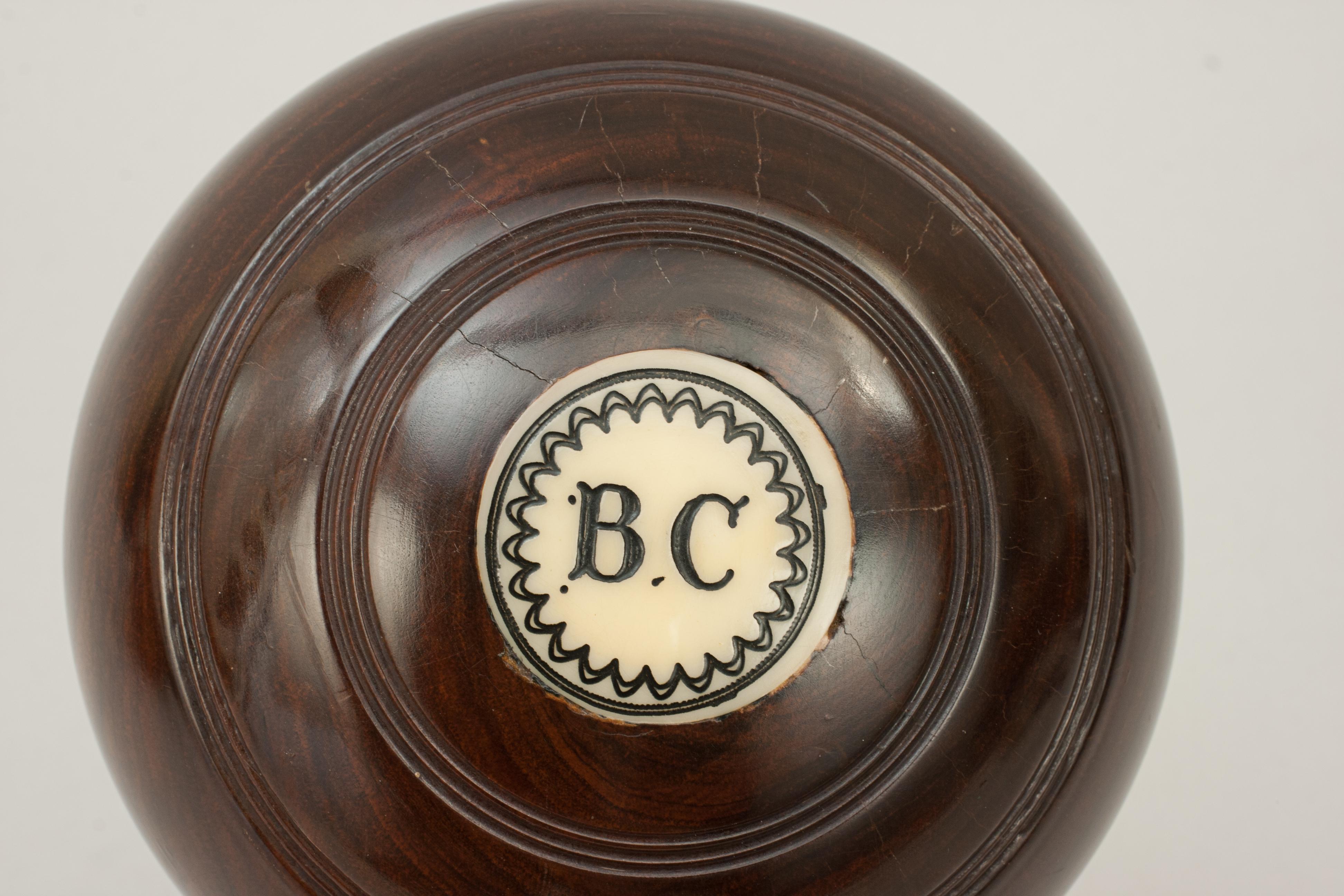 Wood Set of Four Lawn Bowls, George Mackay, Edinburgh