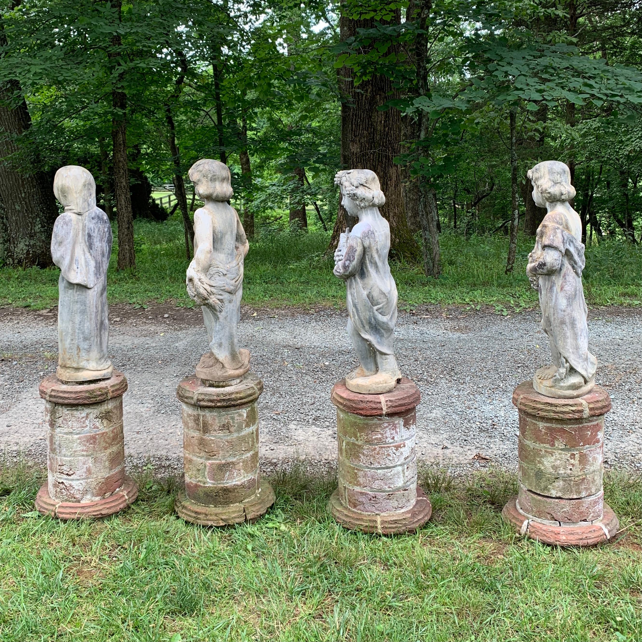 four seasons statues