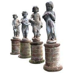 Set of Four Lead Garden Statues Depicting the Four Seasons