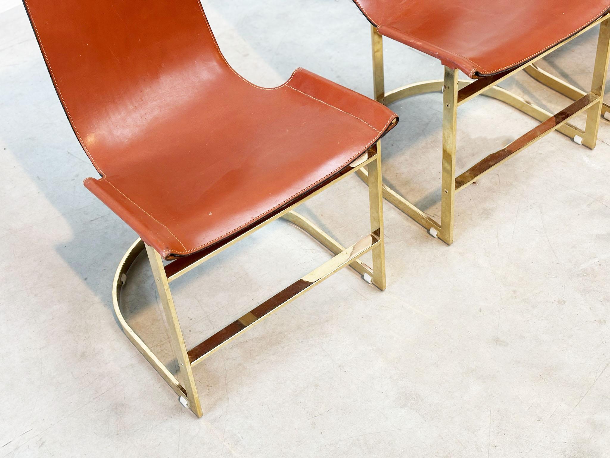 Late 20th Century Set of four leather and brass Italian dining chairs For Sale