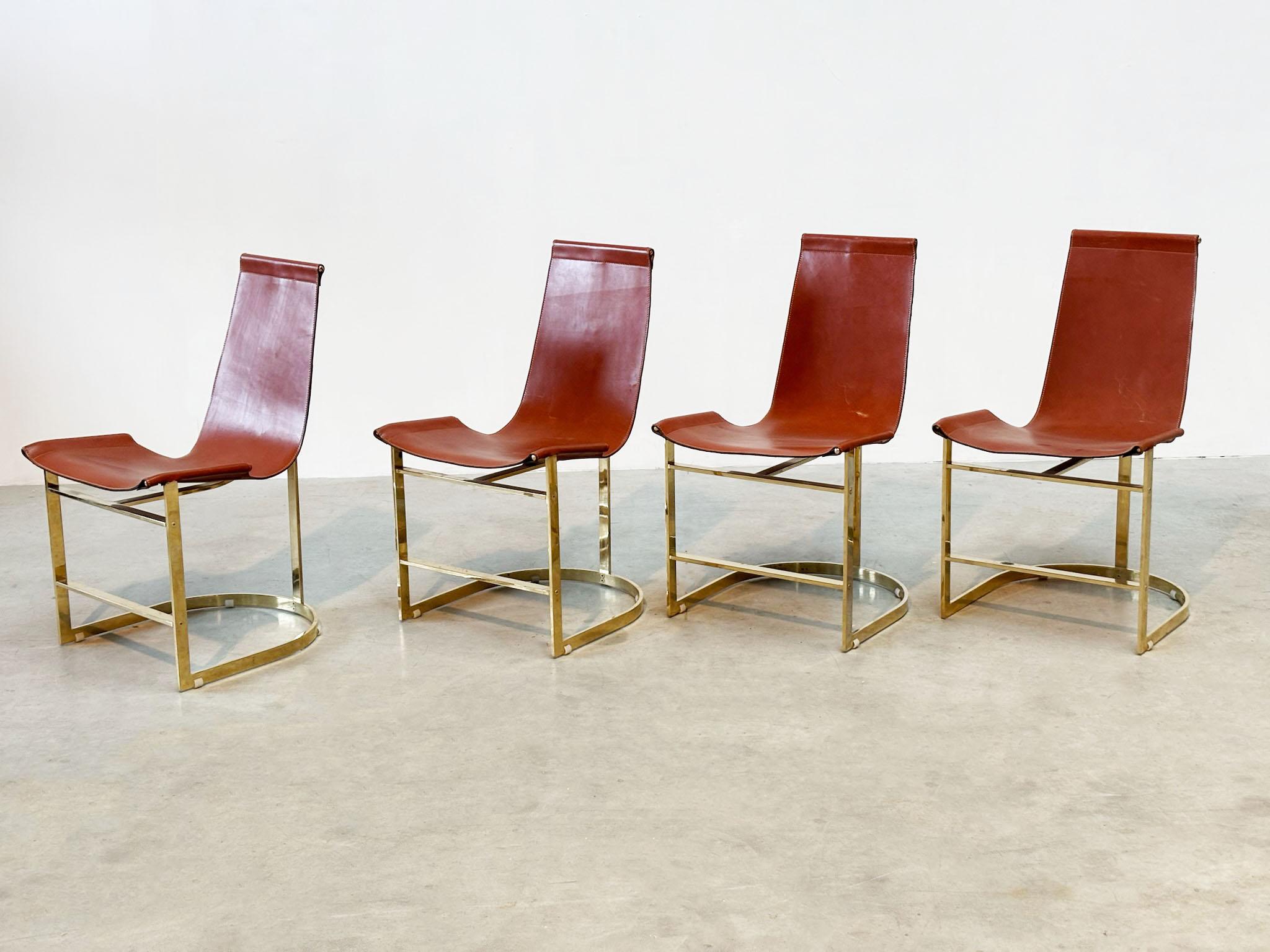 Set of four leather and brass Italian dining chairs For Sale 1