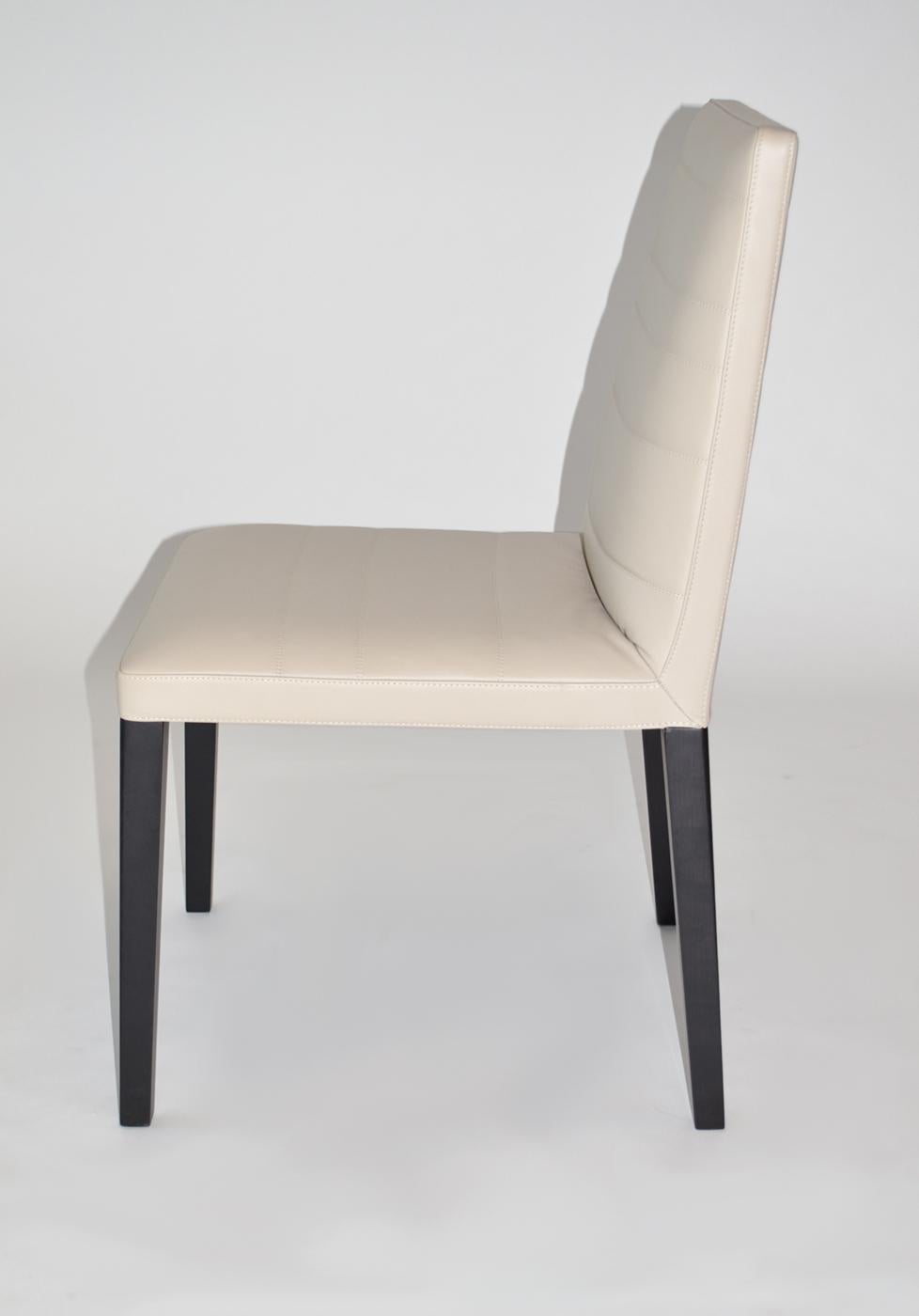 Modern Set of Four Leather and Wood Dining Chairs by Poltrona Frau. 'Louise' 