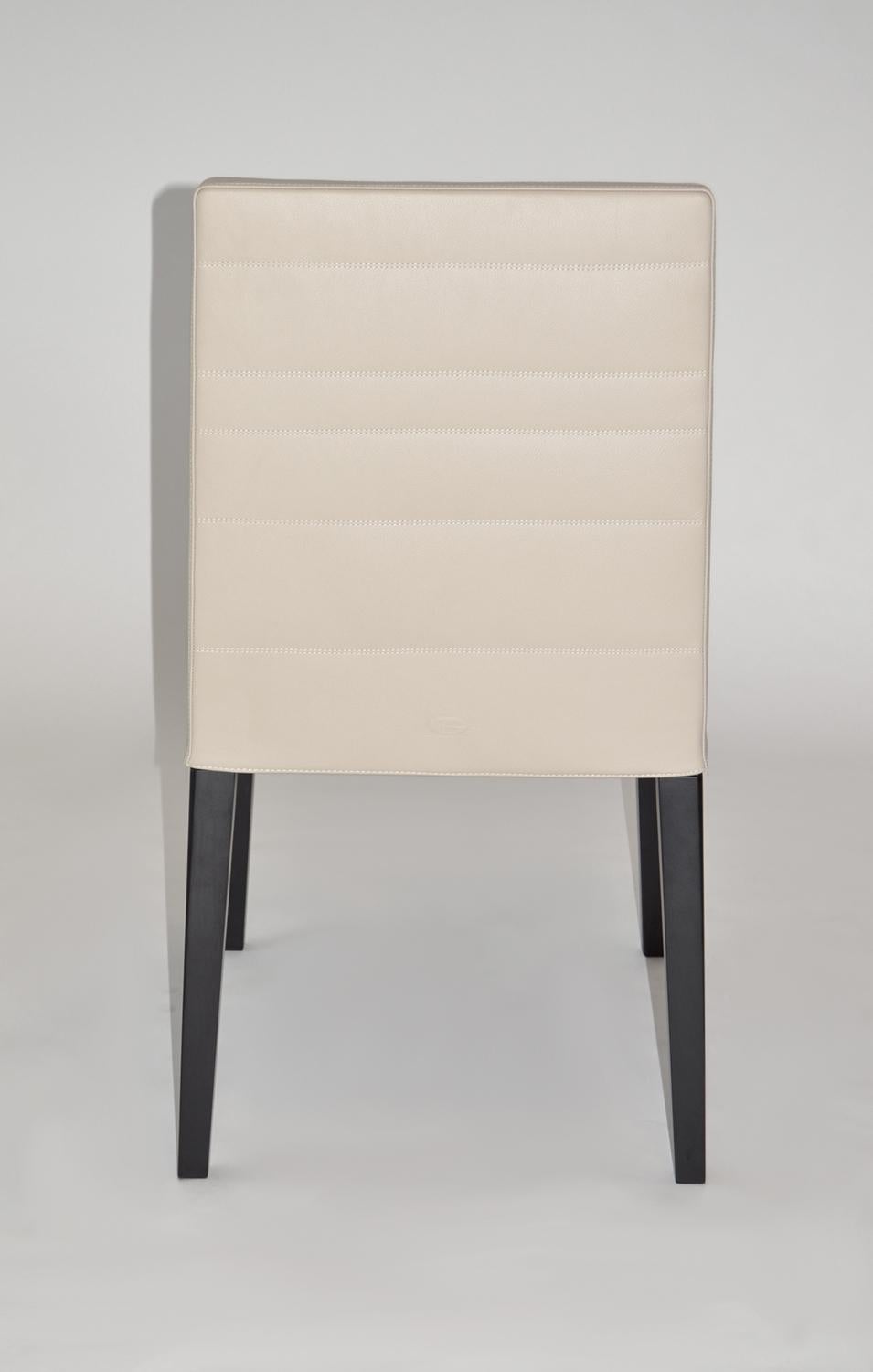 Italian Set of Four Leather and Wood Dining Chairs by Poltrona Frau. 'Louise'