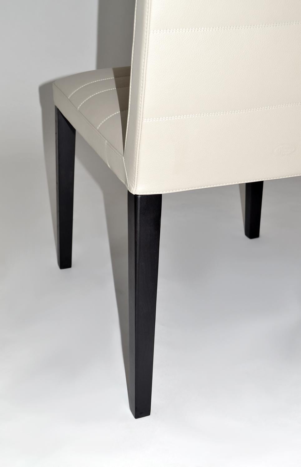 Set of Four Leather and Wood Dining Chairs by Poltrona Frau. 'Louise' In Excellent Condition In Fort Lauderdale, FL