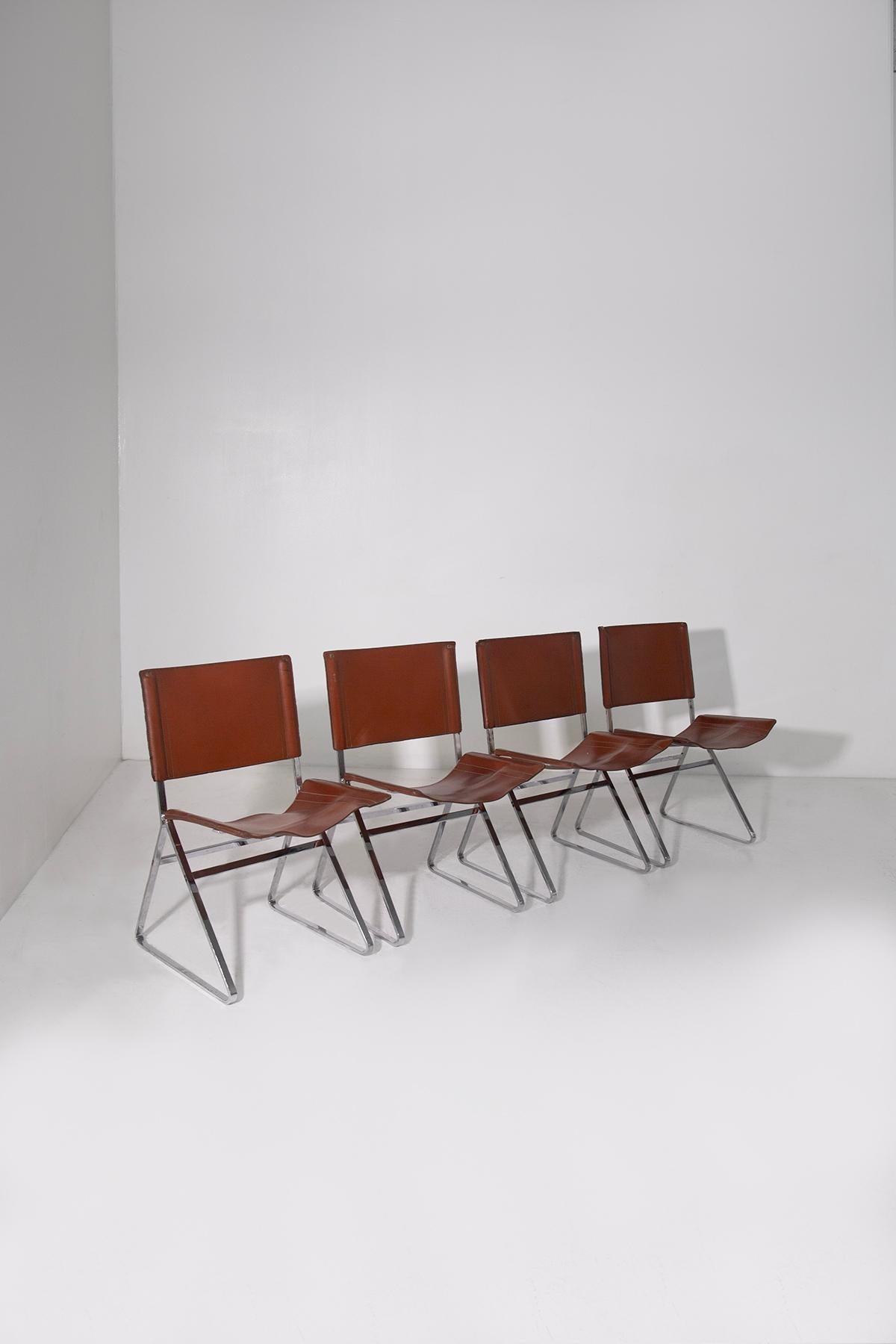 Mid-Century moderno Set of four leather chairs attr. to Pierre Paulin and steel in vendita