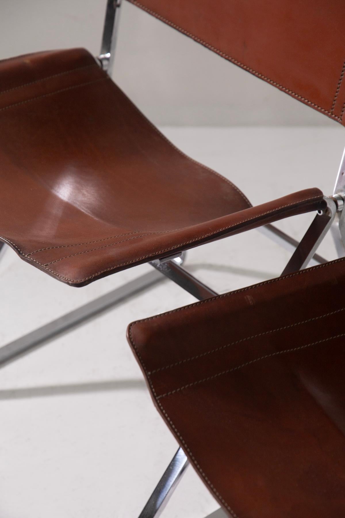 Italian Set of four leather chairs attr. to Pierre Paulin and steel in vendita