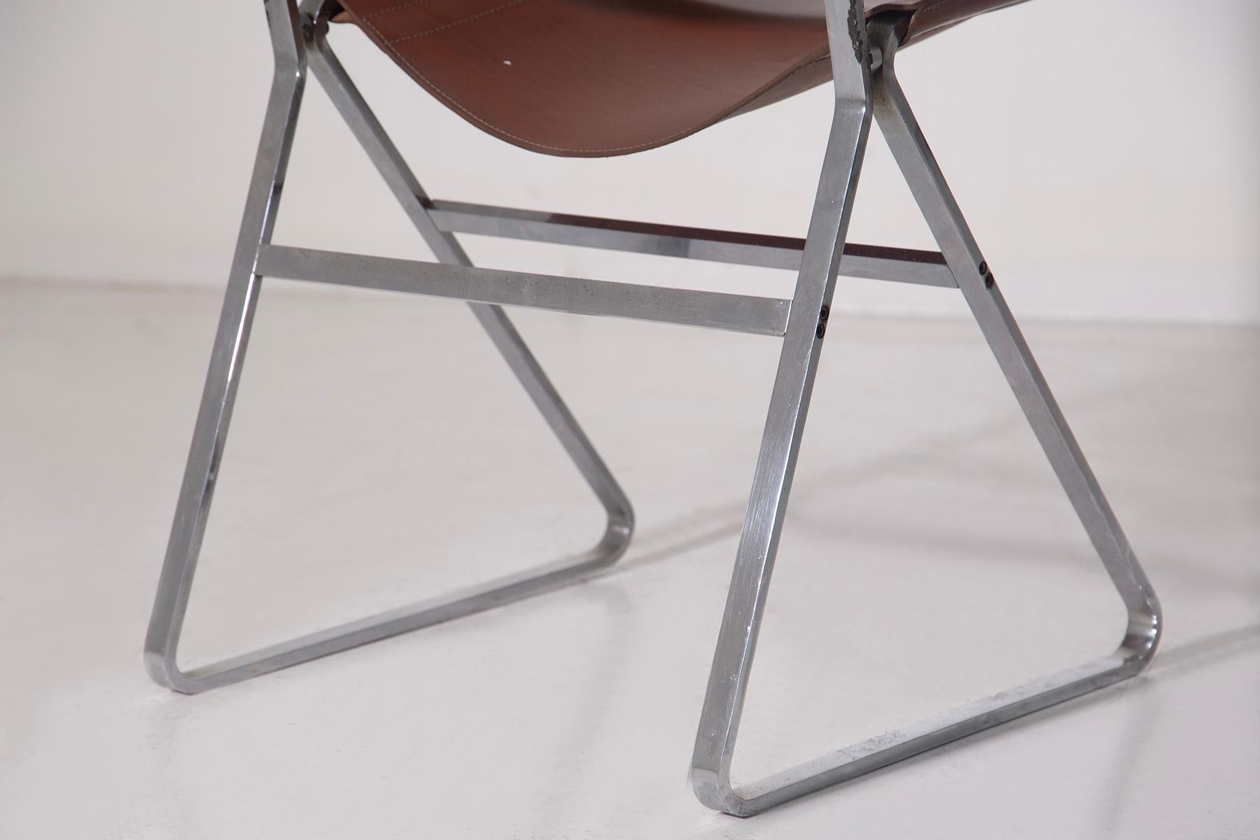 Set of four leather chairs attr. to Pierre Paulin and steel In condizioni buone in vendita a Milano, IT