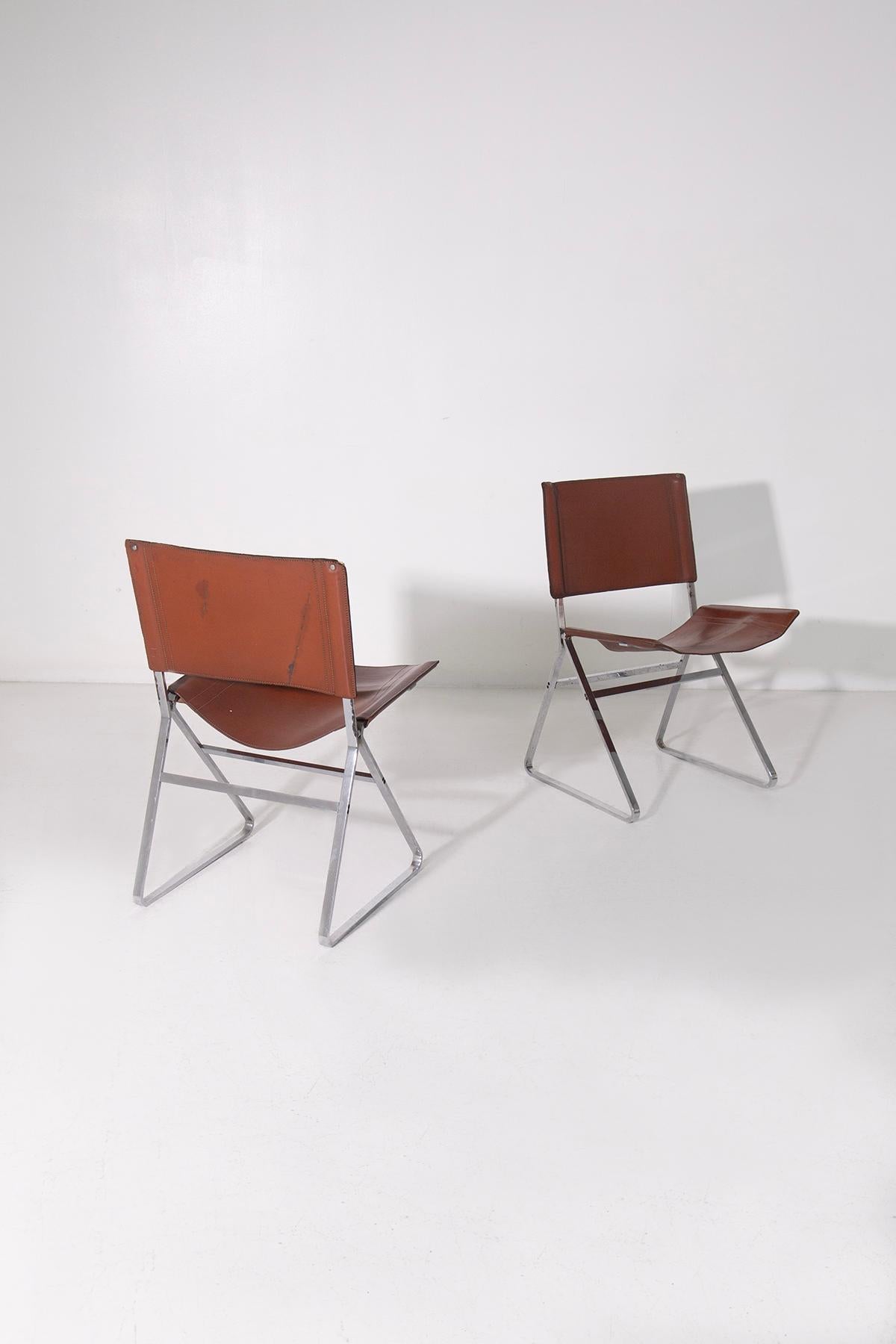 Acciaio Set of four leather chairs attr. to Pierre Paulin and steel in vendita