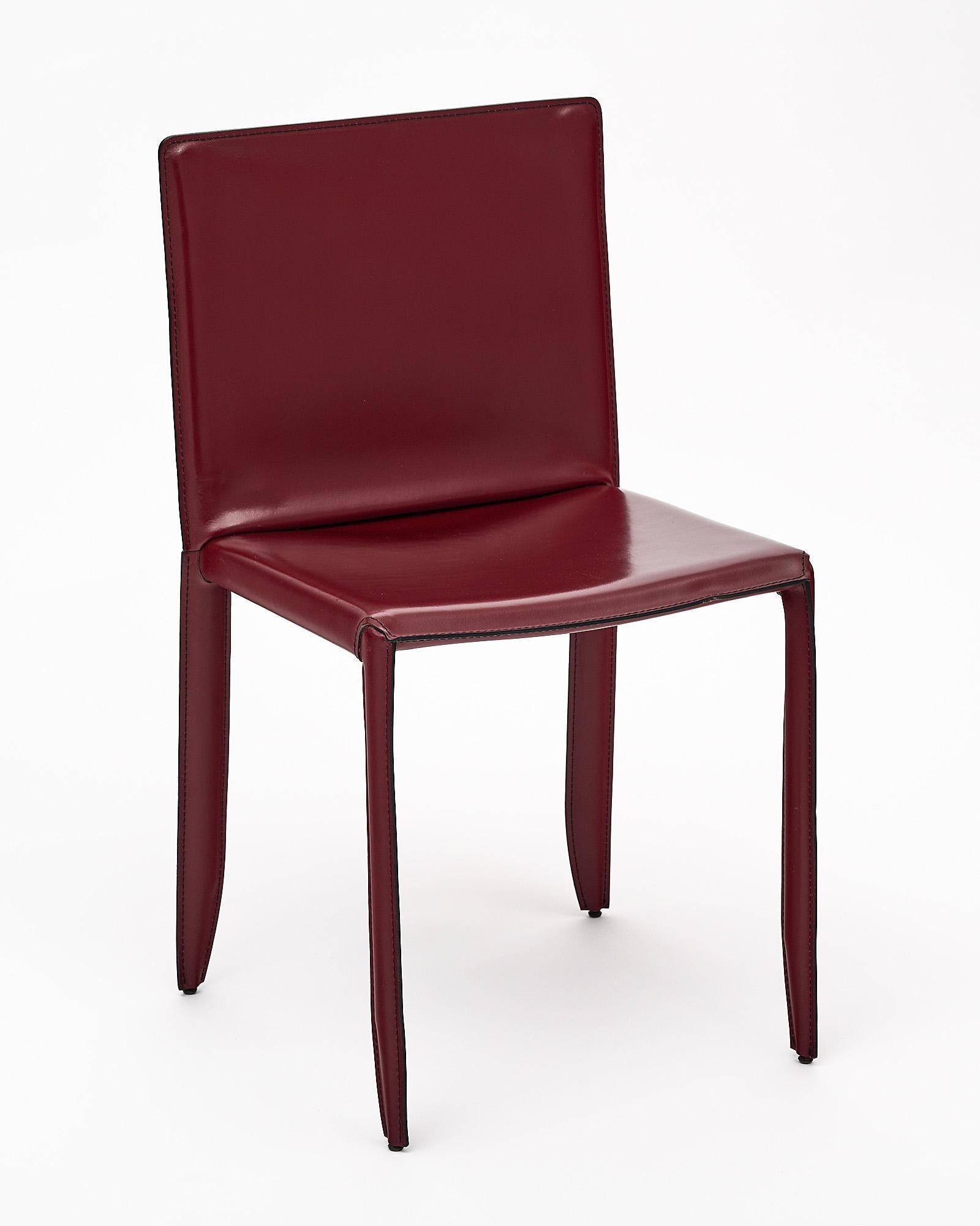 Set of four chairs by Cattelan Italia, stitched red leather.