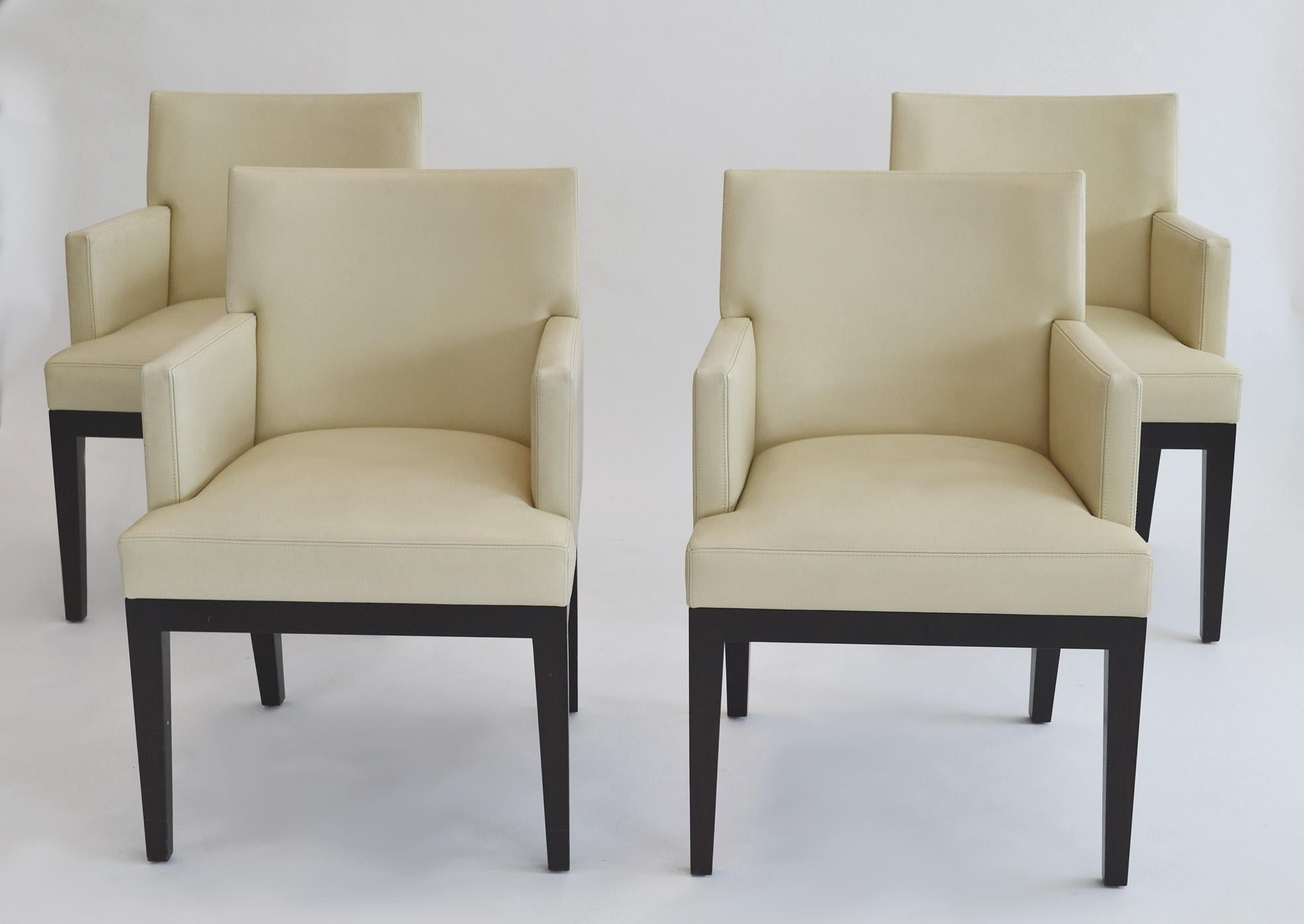 Set of Four Leather Dining / Arm Chairs Christian Liaigre for Holly Hunt c. 2000
Made in France for Holly Hunt in lacquered mahogany upholstered in soft butter-colored leather.
Brass manufacturer's label to underside of each example ‘Christian
