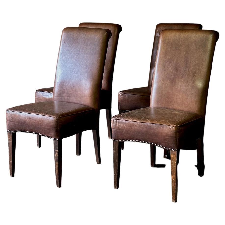 Set of four Dutch midcentury dining chairs with original chestnut leather upholstery. A classic set with exquisite patina and clean, simple lines. Traditional yet modern.

Netherldands, circa 1970

Dimensions: 18.9 W x 25.6 D x 39.4 H x 19.7 SH.