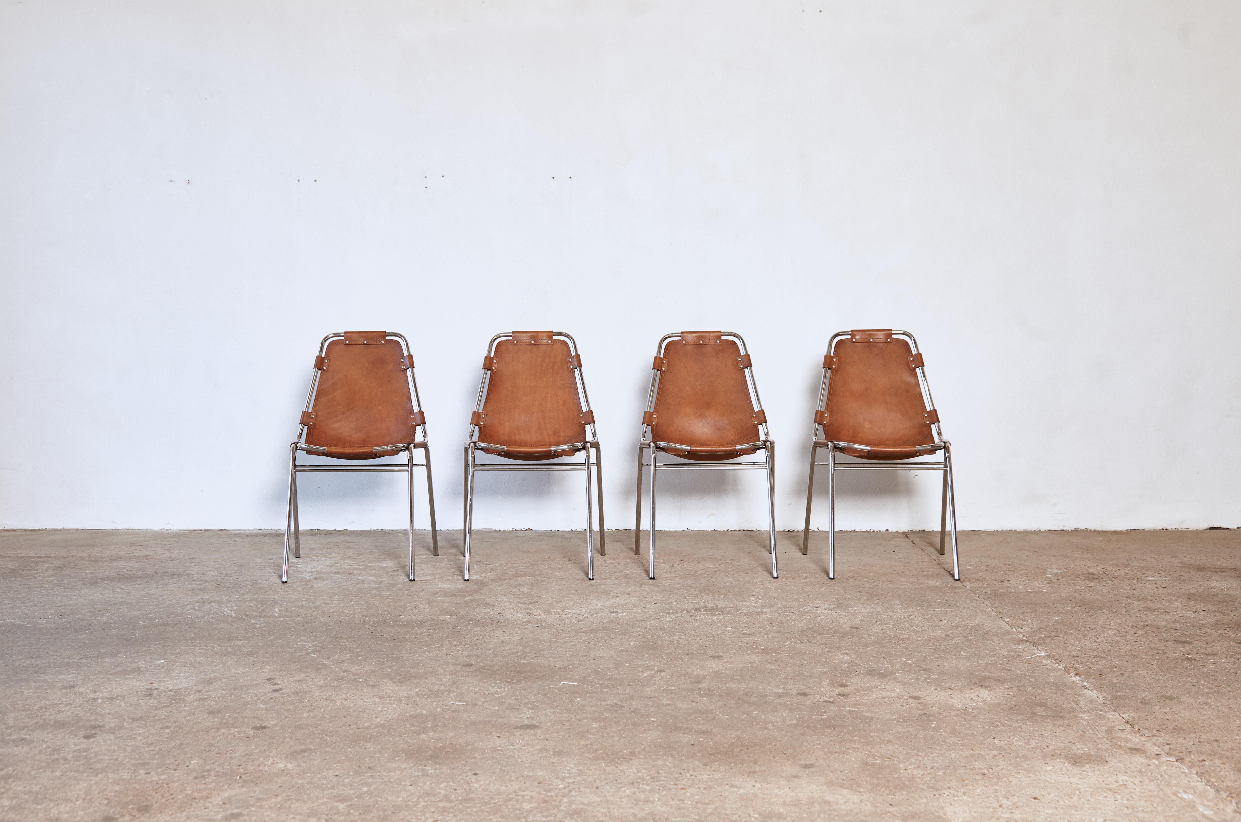 A fantastic set of four original Les Arcs chairs rarely found in such excellent condition. Tubular steel and cognac leather, France/Italy. Marked 1972.

Les Arcs was a project on which Charlotte Perriand collaborated with some other architects who