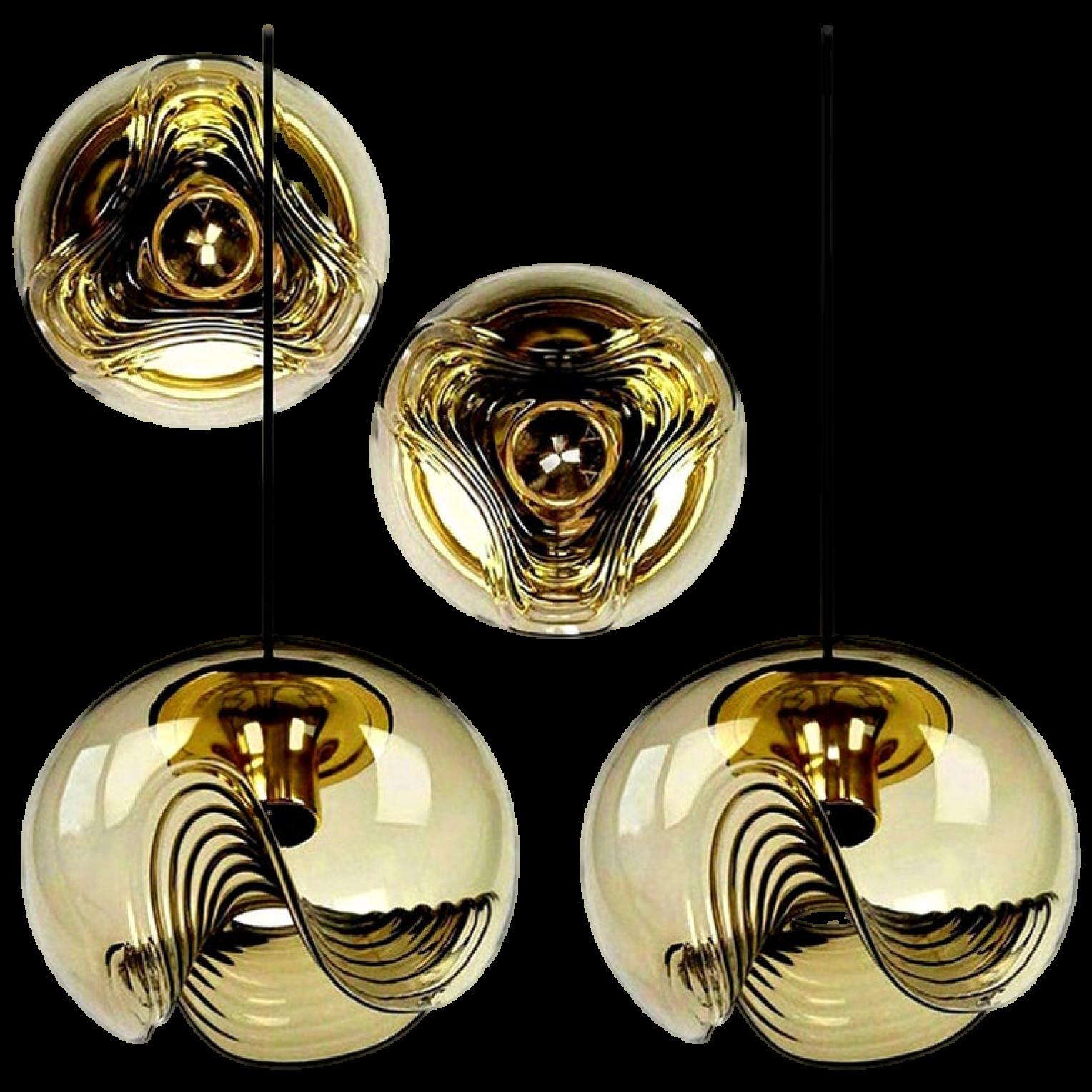 A special set of round biomorphic smoked glass light fixtures designed by Koch & Lowy for Peill & Putzler, manufactured in Germany, circa 1970s. These Peill & Putzler vintage wall lights become quickly design classics.

The blown glass has a