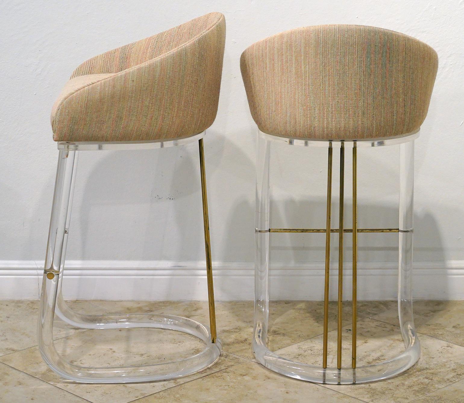 Set of Four Lion in Frost Upholstered Lucite and Brass Swivel Bar Stools, Signed In Good Condition In Ft. Lauderdale, FL