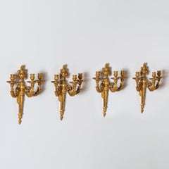 Set of Four Louis XV Ormolu Three Branch Wall Lights Circa 1770