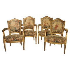 Ensemble de quatre fauteuils Louis XVI en bois doré et tapisserie de France, 18ème siècle