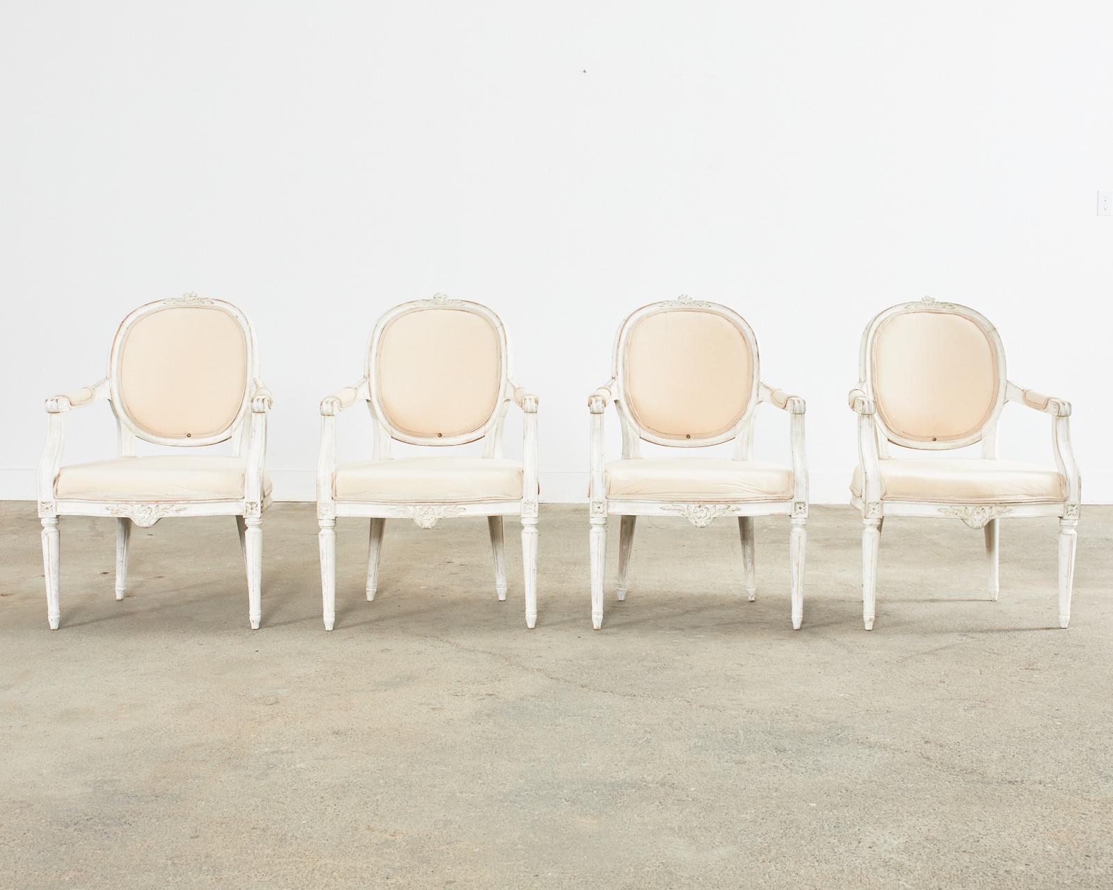 French Set of Four Louis XVI Gustavian Style Painted Dining Armchairs For Sale